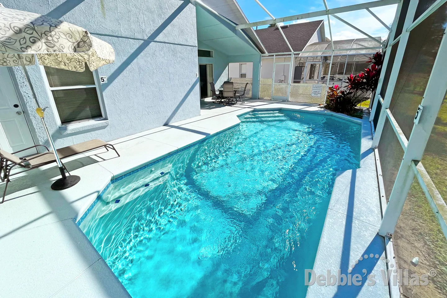 Large sun-drenched west-facing pool deck at this Davenport vacation villa