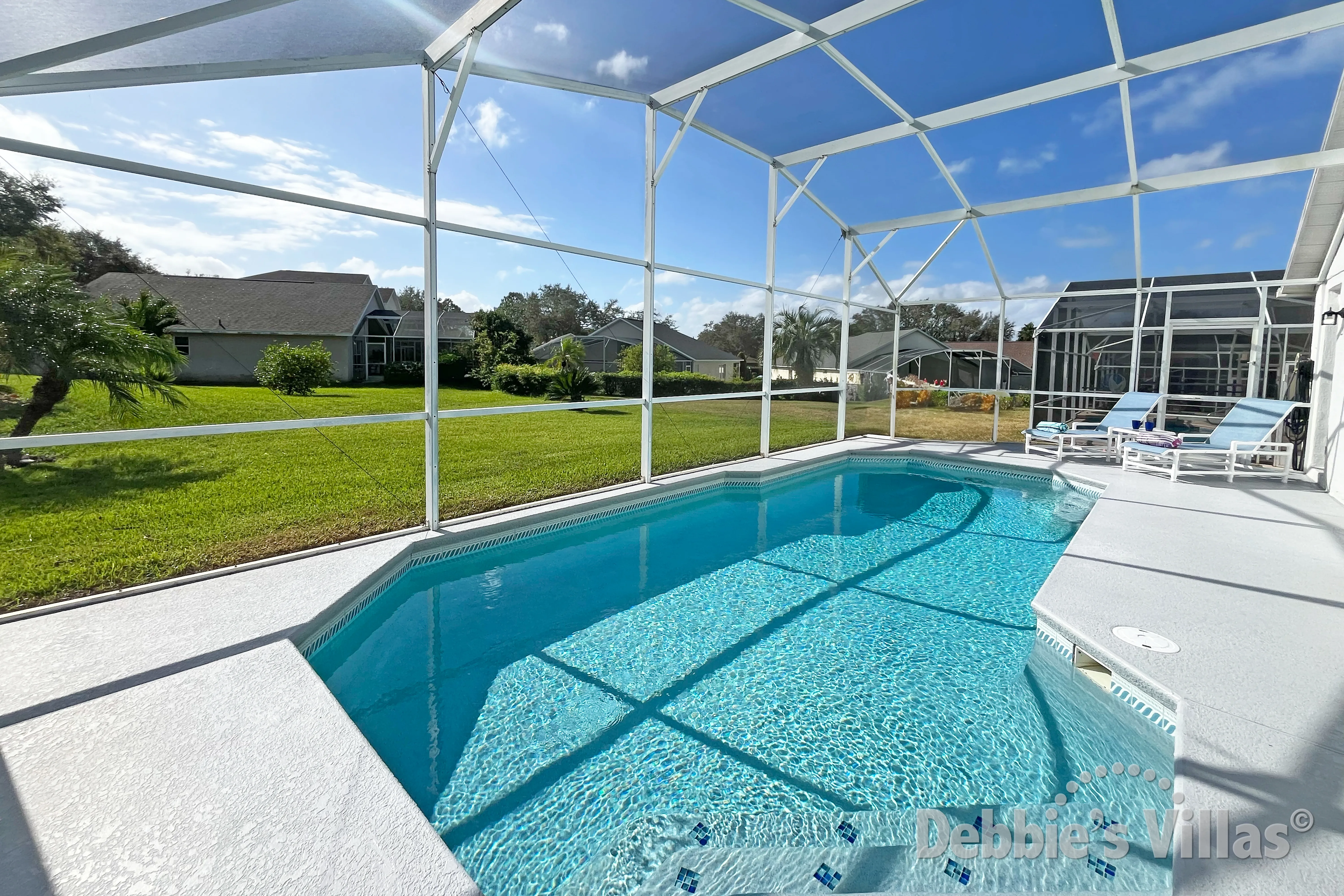 Southeast-facing pool deck with no overlooking rear neighbours on Southern Dunes in Haines City