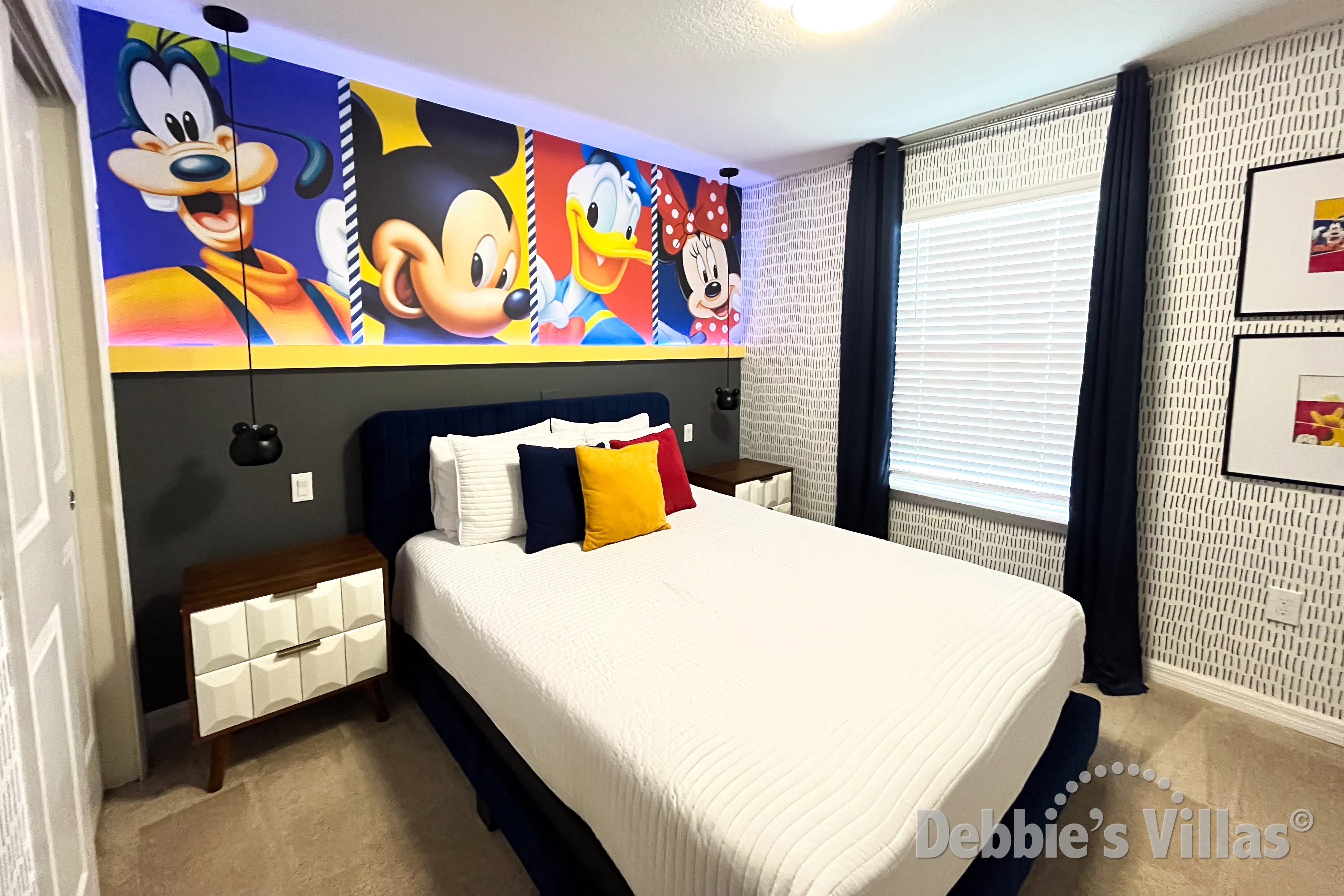 Bedroom 2 has a Disney-theme and Queen-size bed 