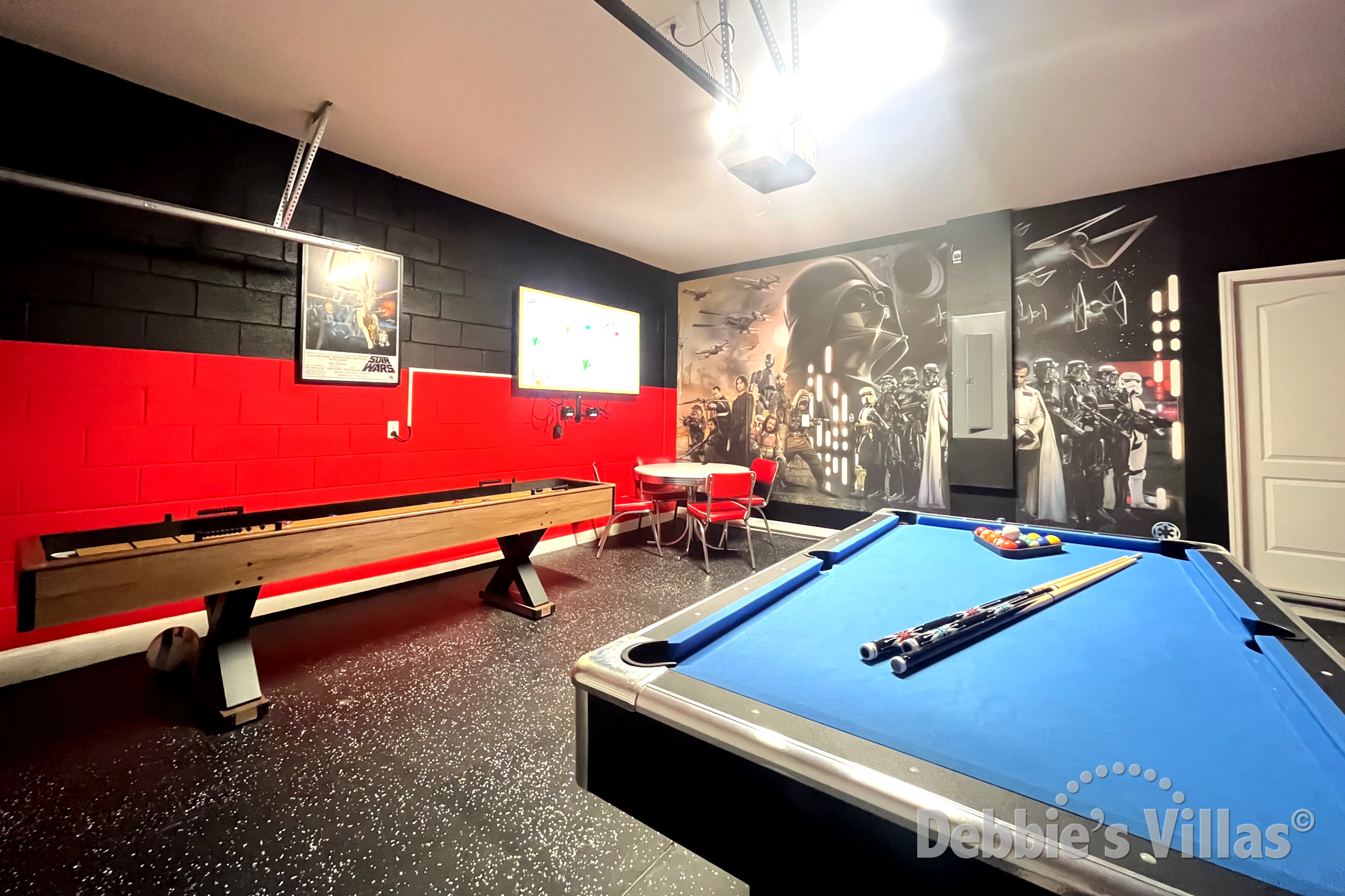 Pool table and shuffleboard in the games room at this vacation villa on Solterra in Davenport