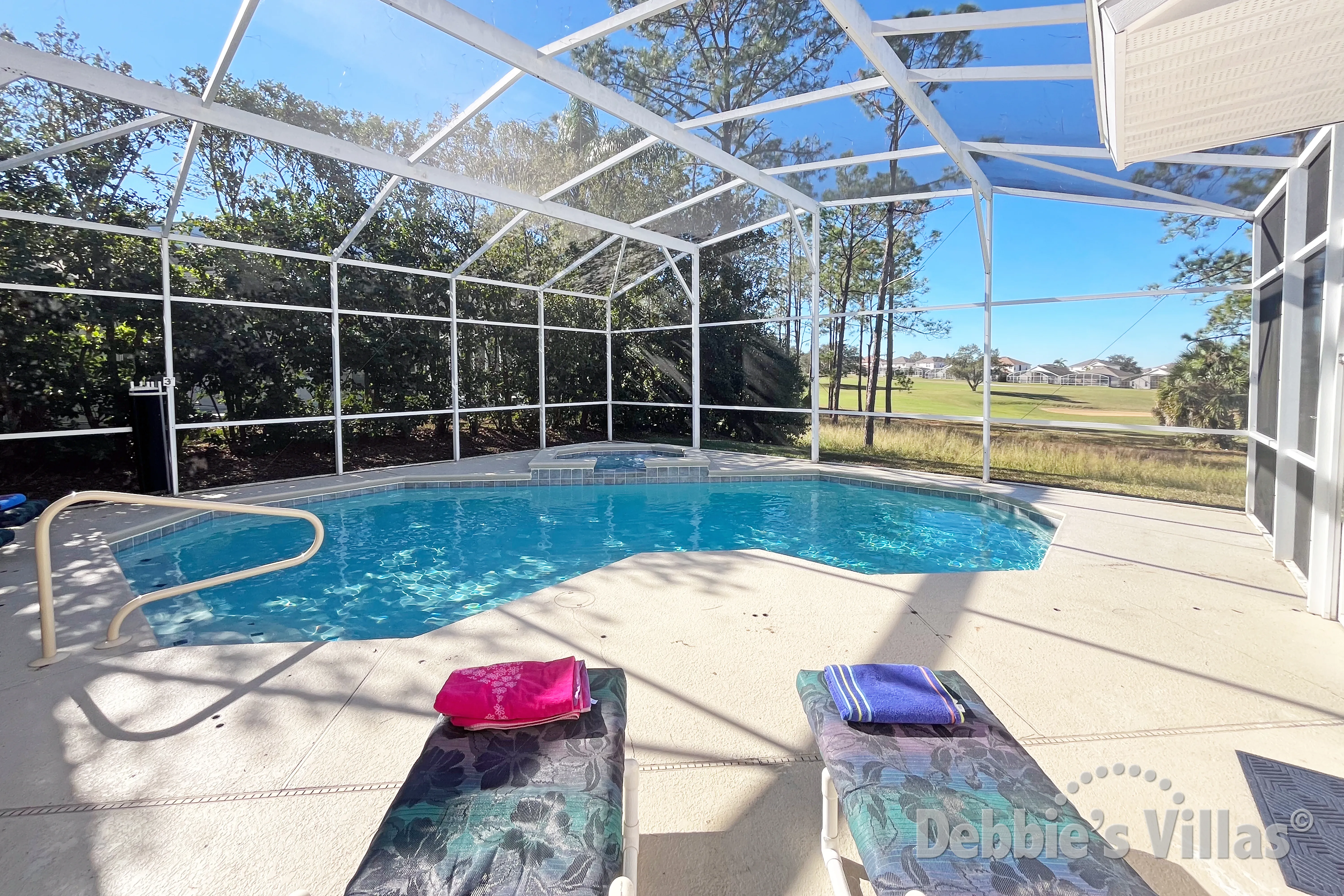 West-facing pool and spa at this vacation villa on Highlands Reserve in Davenport