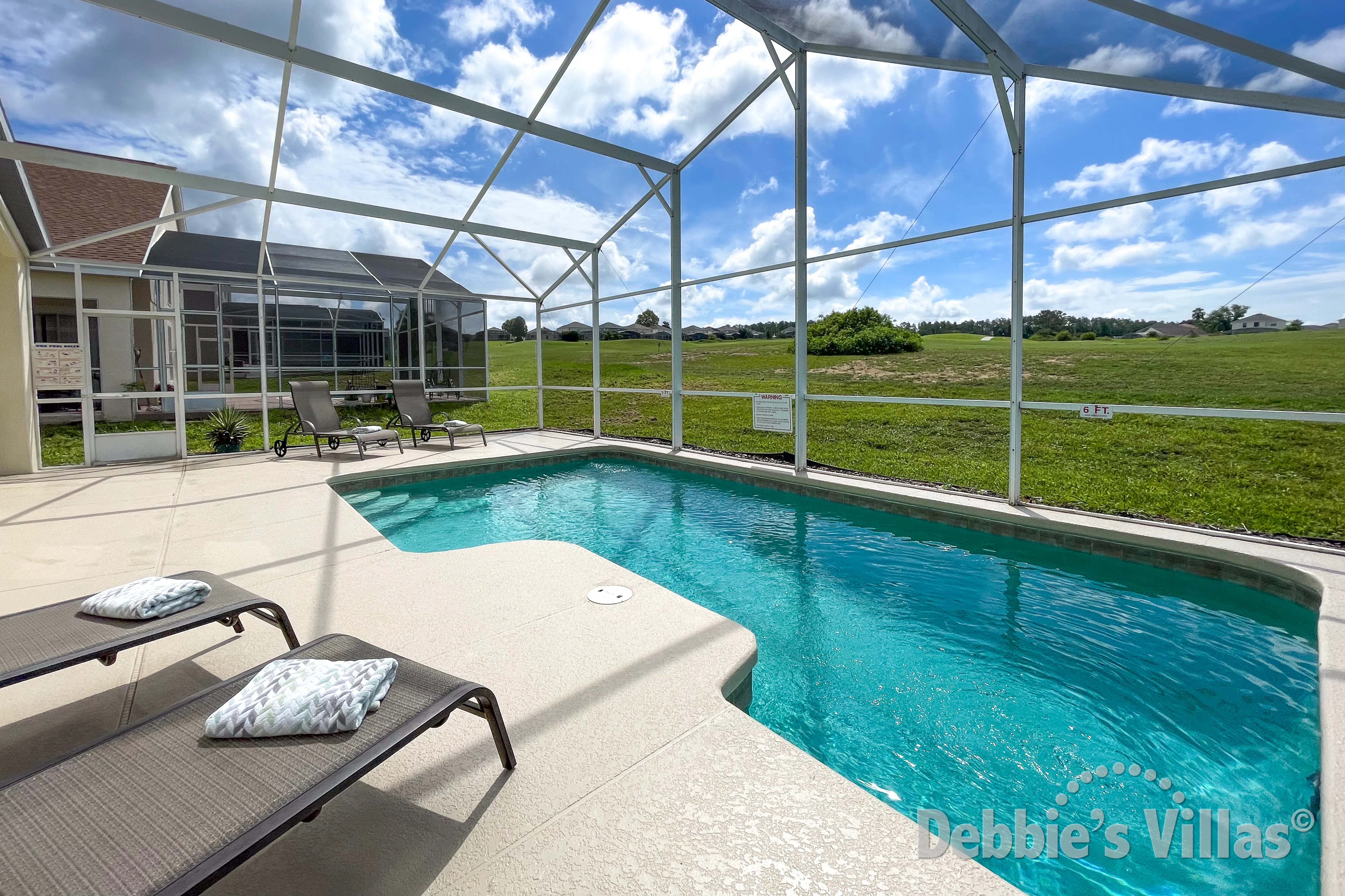 Have a swim in your very own private southeast-facing pool at this Davenport vacation villa