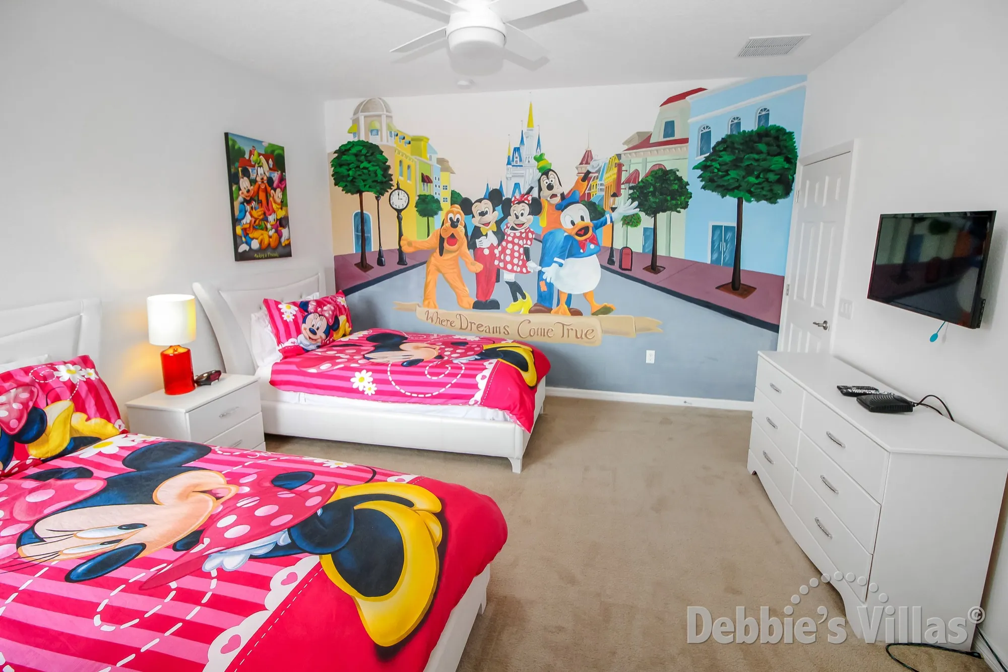Bedroom 5 with Twin beds and Disney wall art