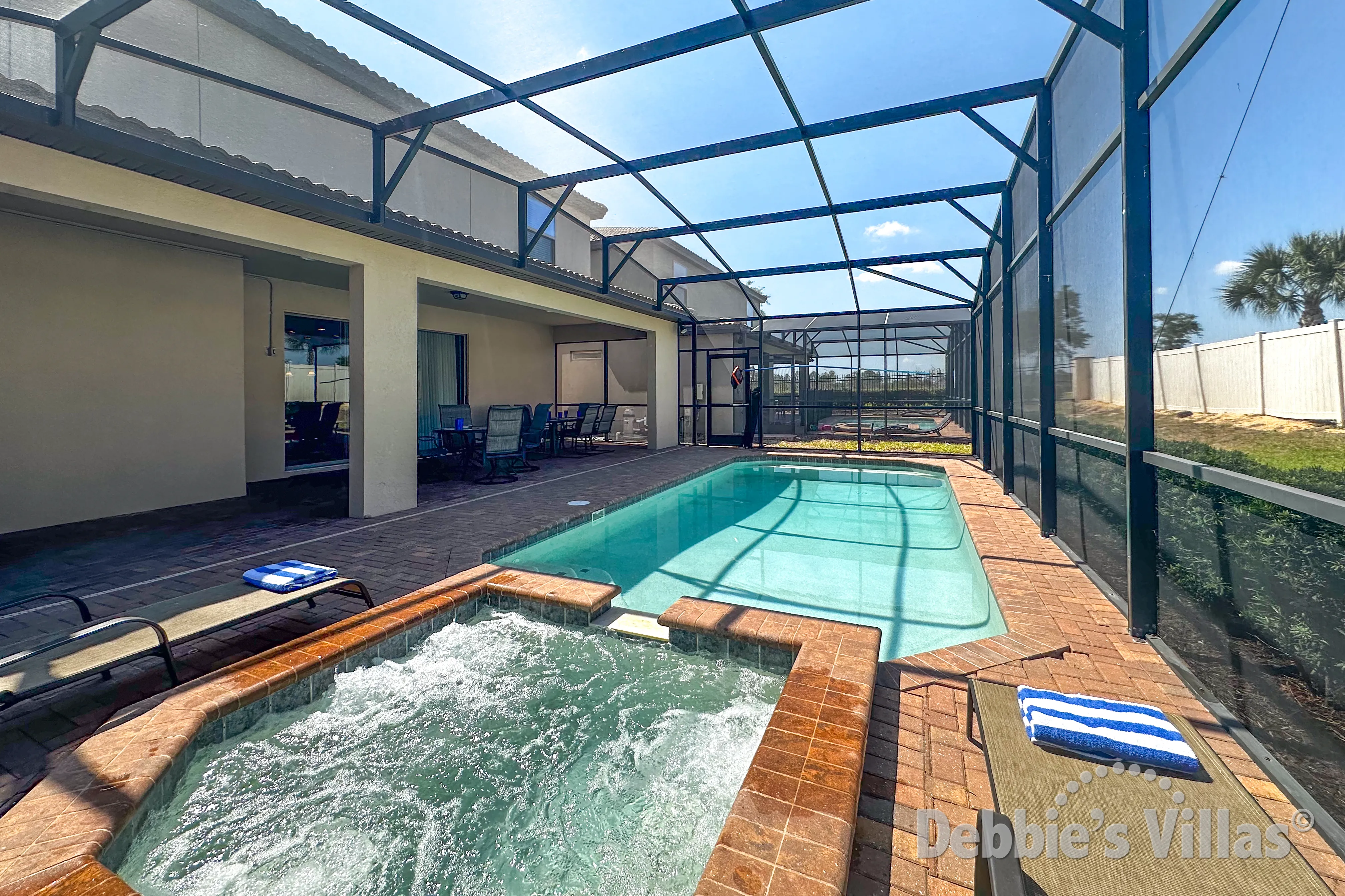 West-facing pool and spa at this vacation villa on Windsor at Westside in Kissimmee