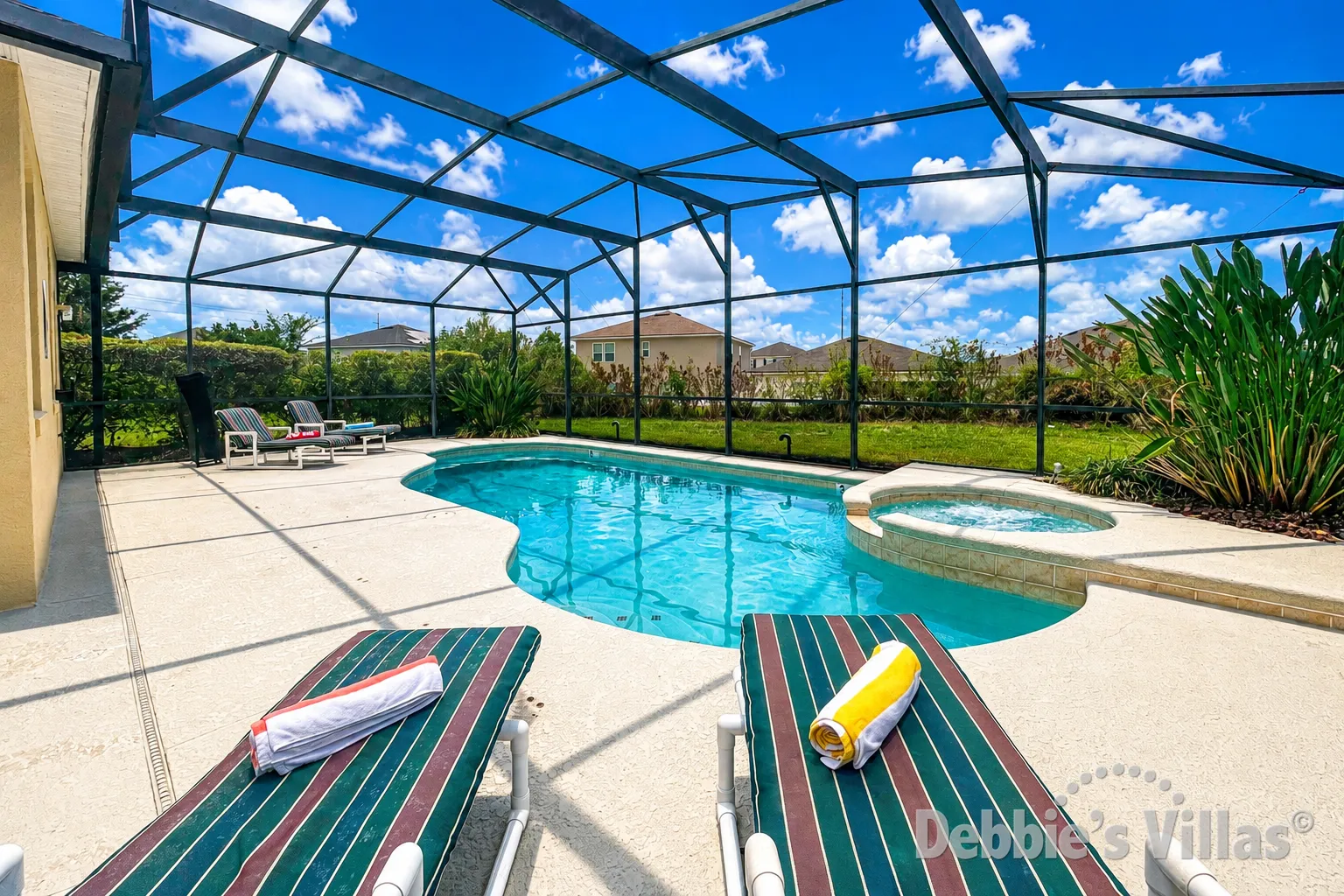 Large South-facing private pool and spa deck at this Davenport vacation villa