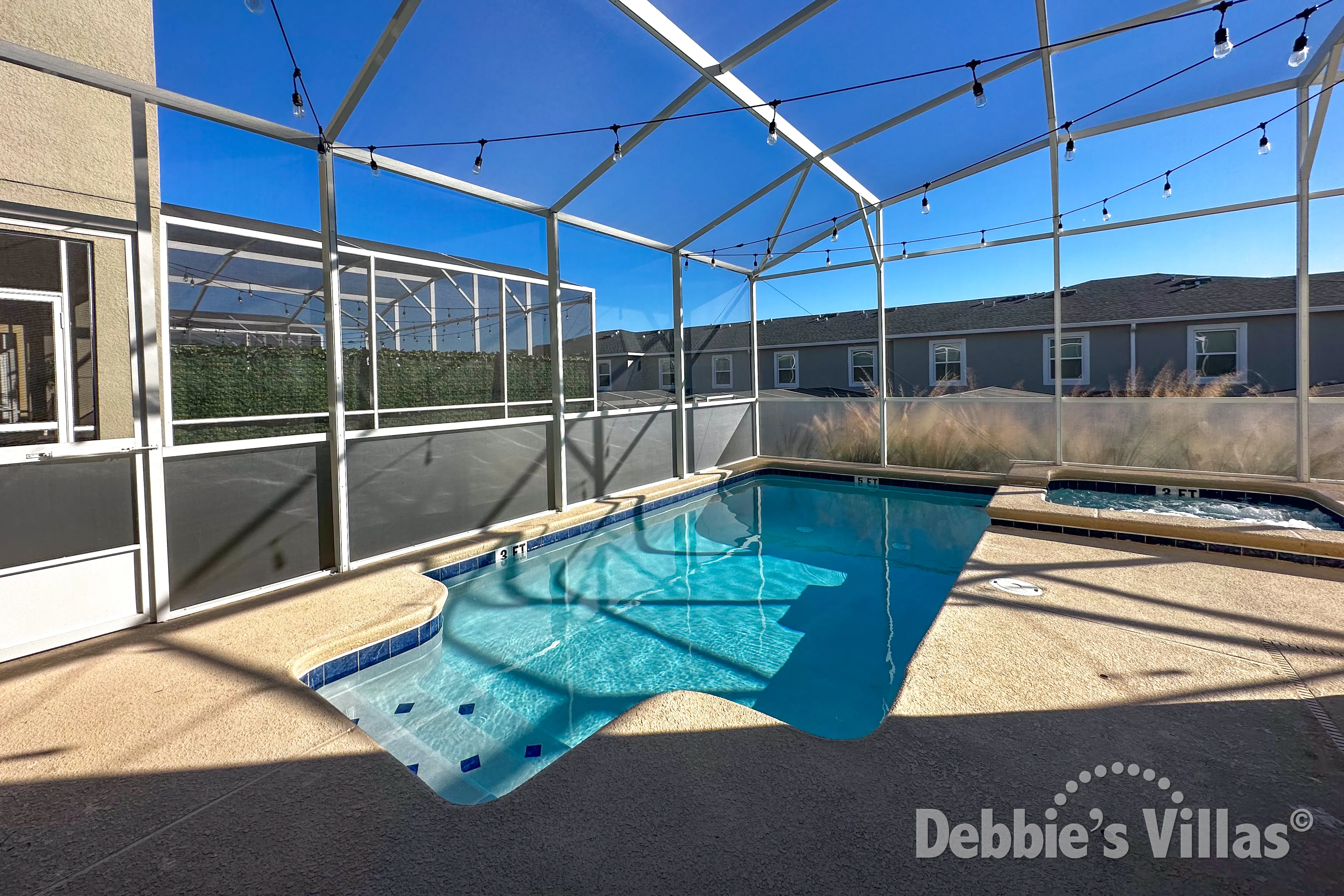Sun drenched private pool and spa deck at this ChampionsGate vacation villa