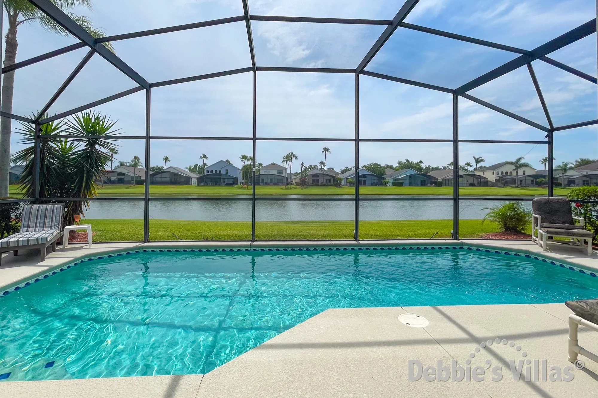 Stunning lake view from the pool deck of this Kissimmee vacation villa