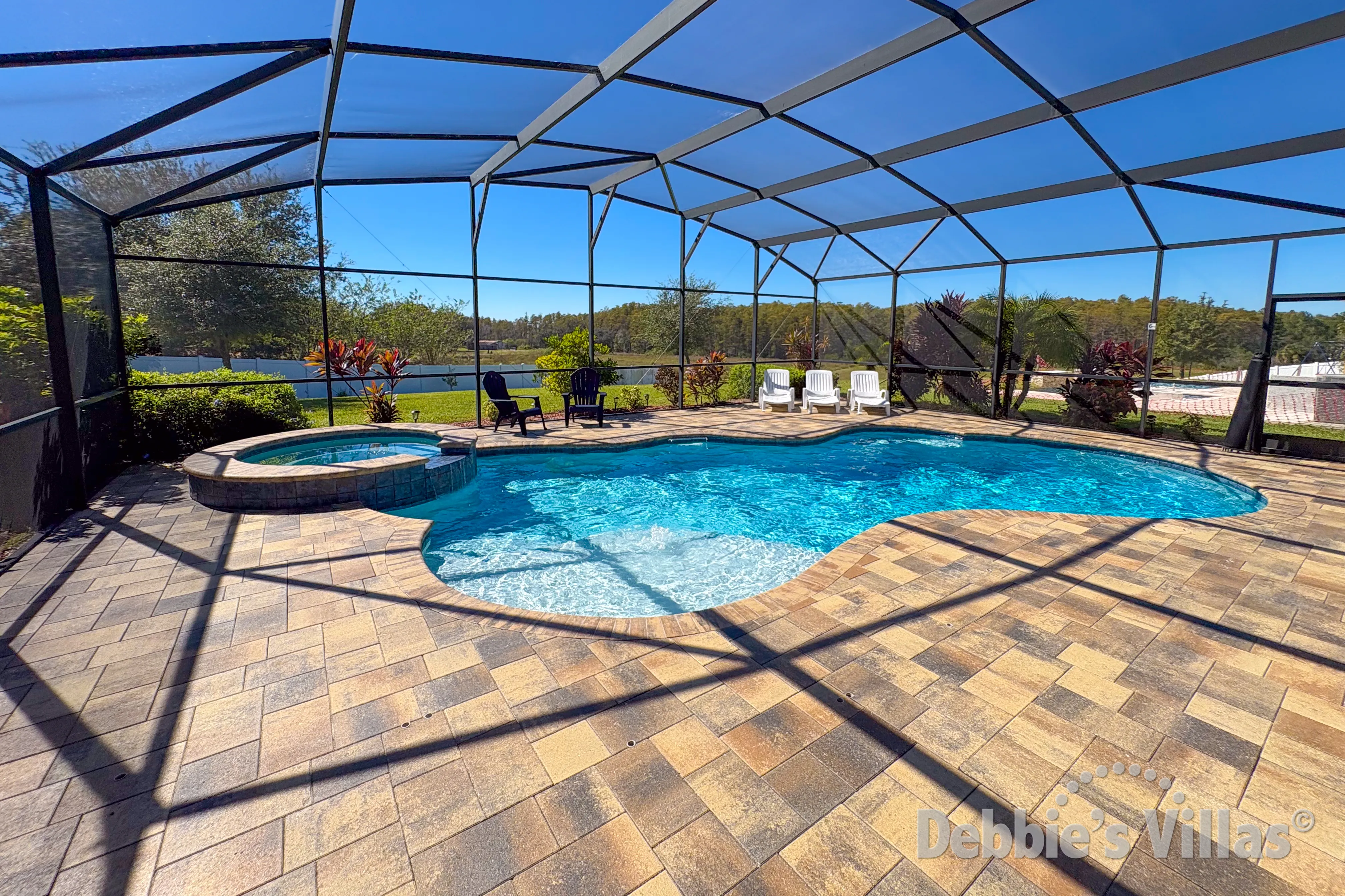Southwest-facing pool and spa at this vacation villa on Laurel Estates in Davenport 