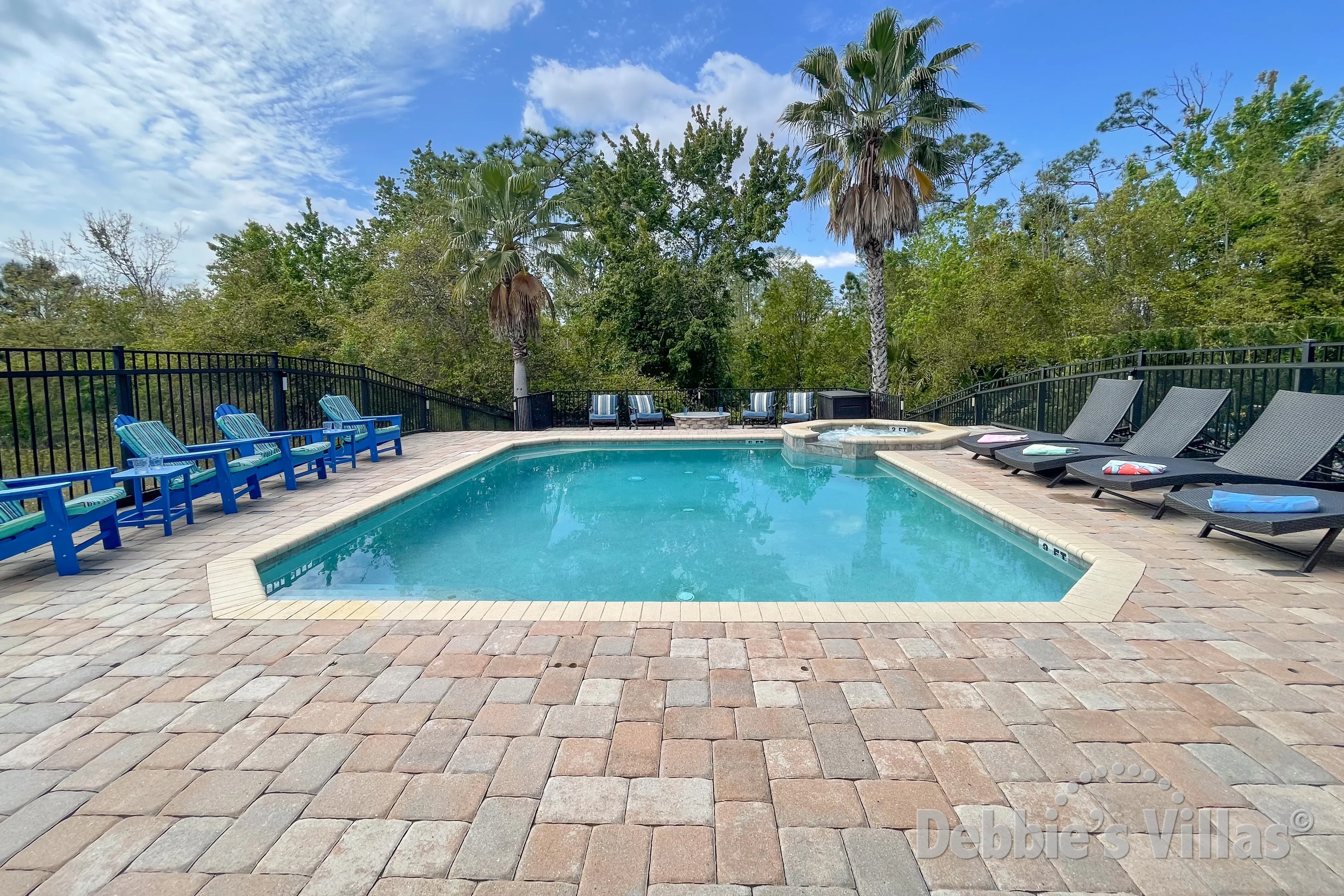 West-facing pool and spa at this vacation villa on Reunion in Kissimmee