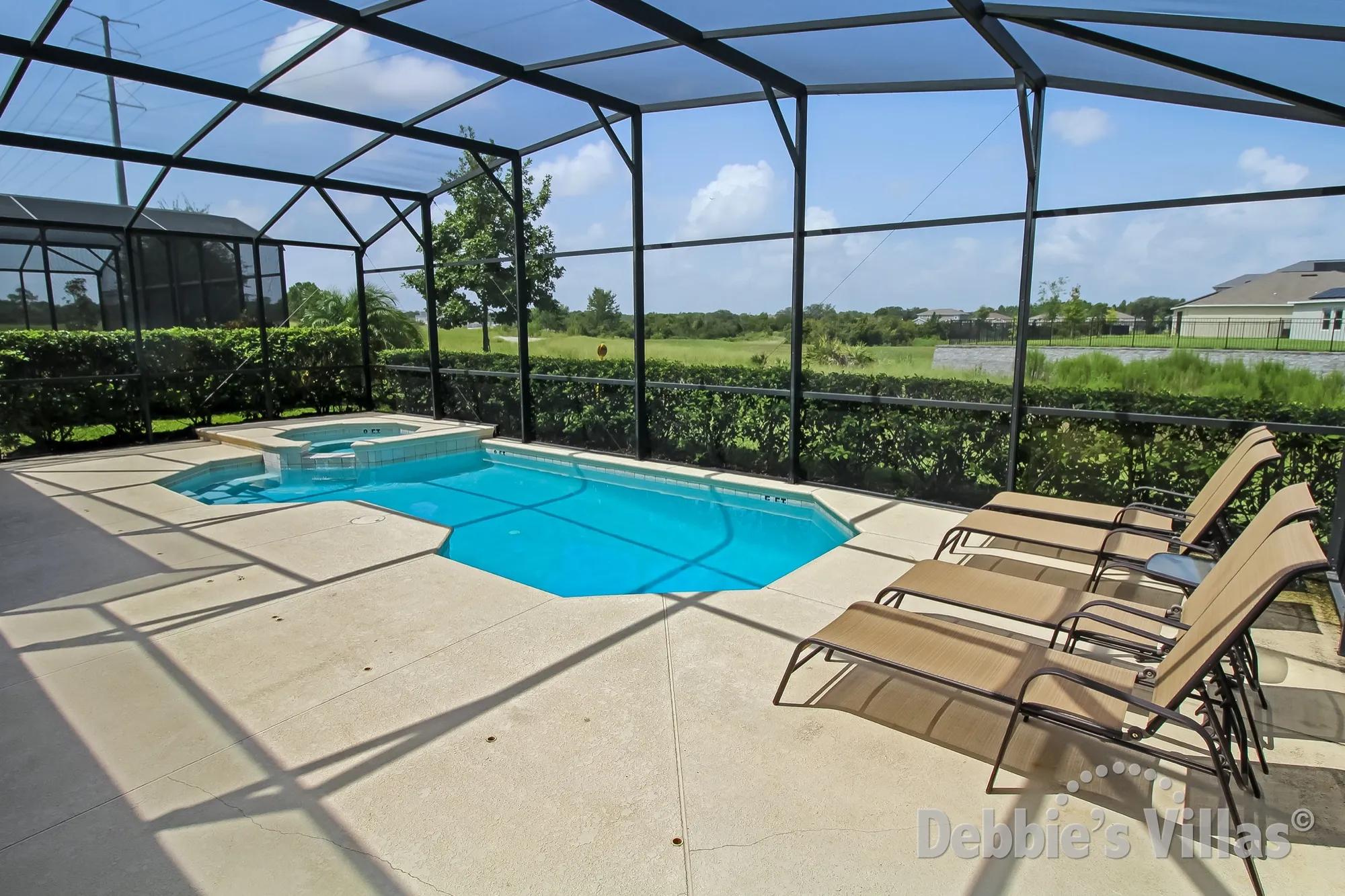 Large pool and spa area at this Providence villa in Davenport