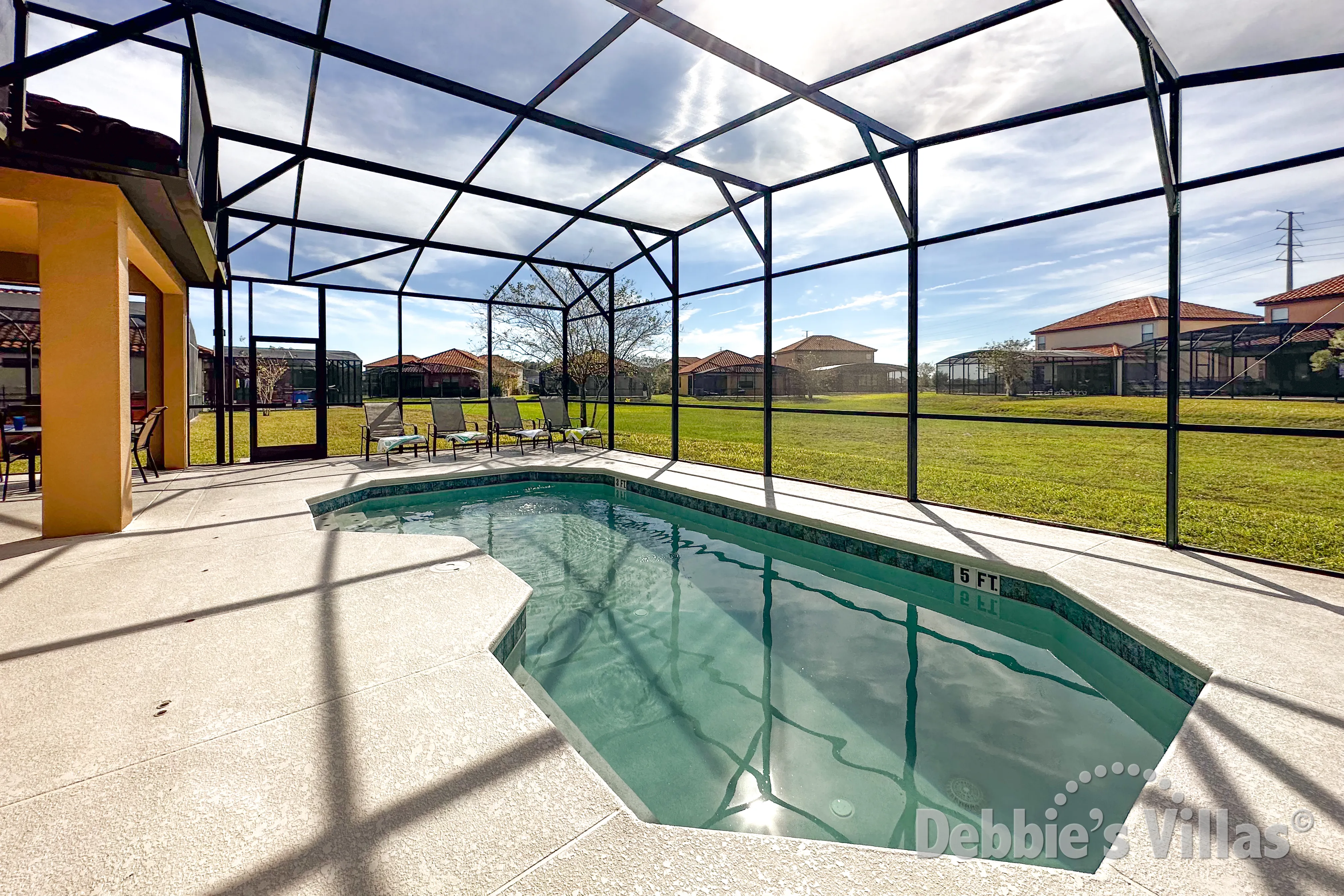 Sunny southwest-facing pool deck with no overlooking neighbours at this Providence vacation villa