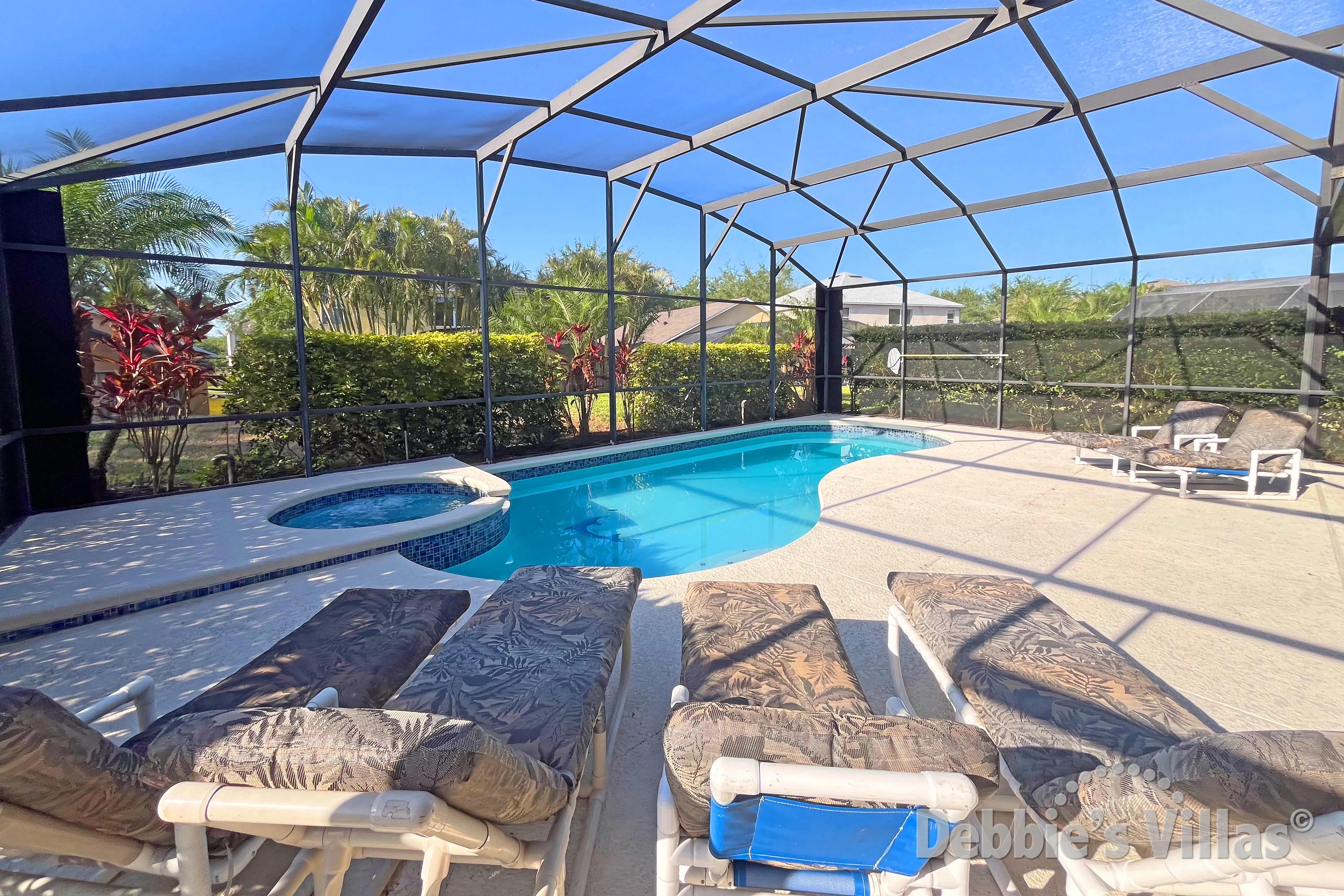 South-facing pool and spa at this vacation villa on Emerald Island in Kissimmee 