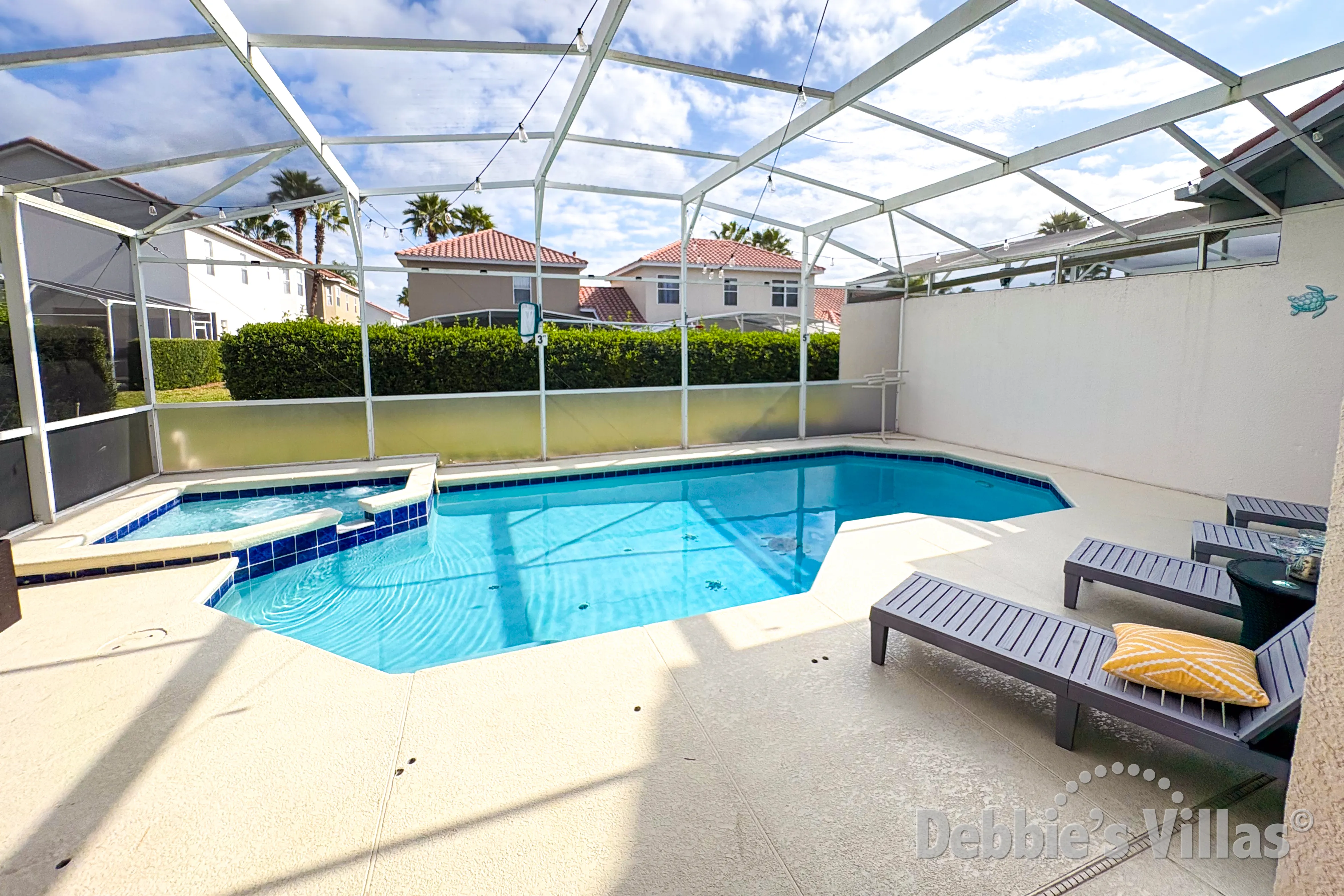 Pool and spa at this courtyard villa on Tuscan Hills in Davenport 
