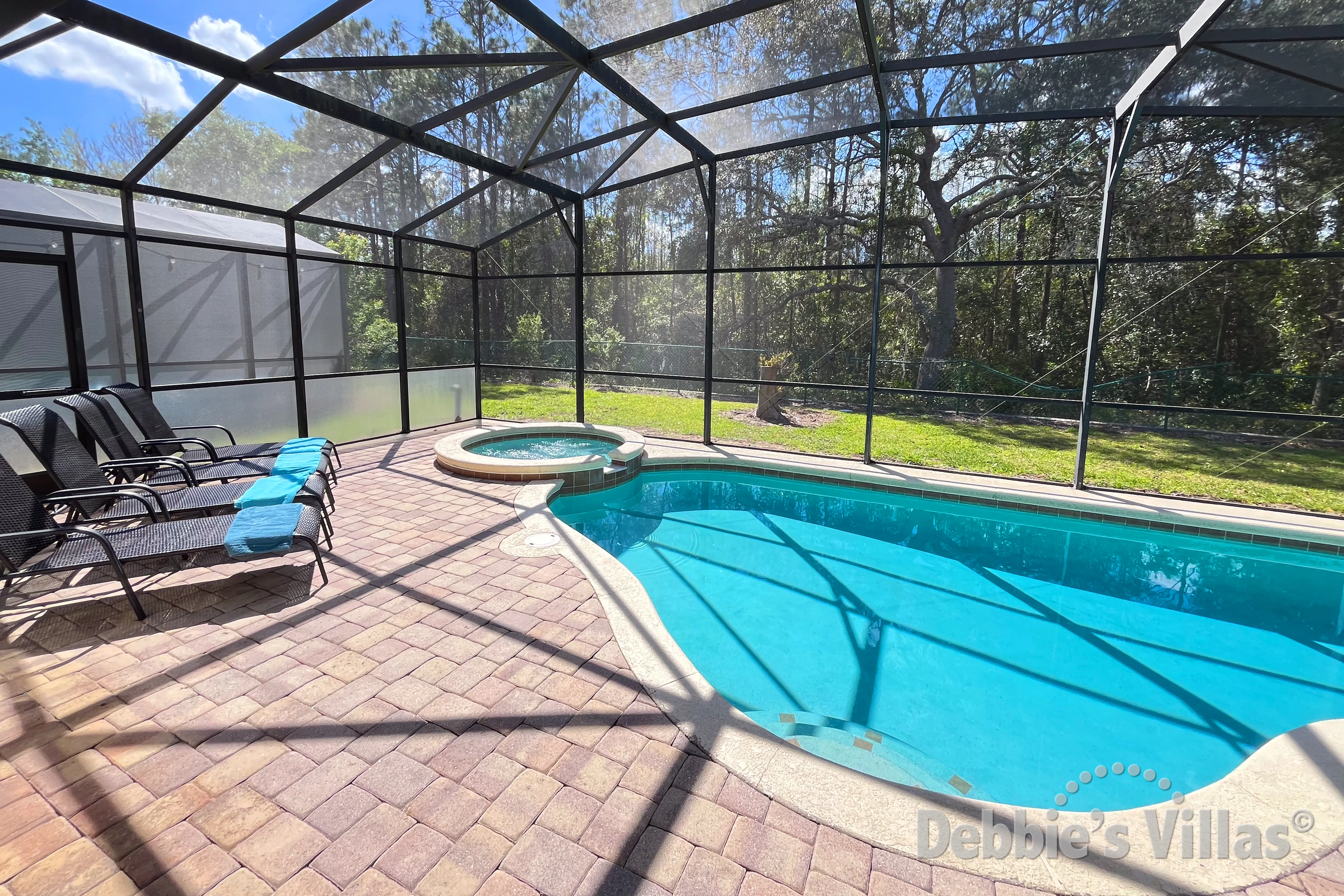West-facing pool and spa at this vacation villa on Tuscany at Westside in Kissimmee