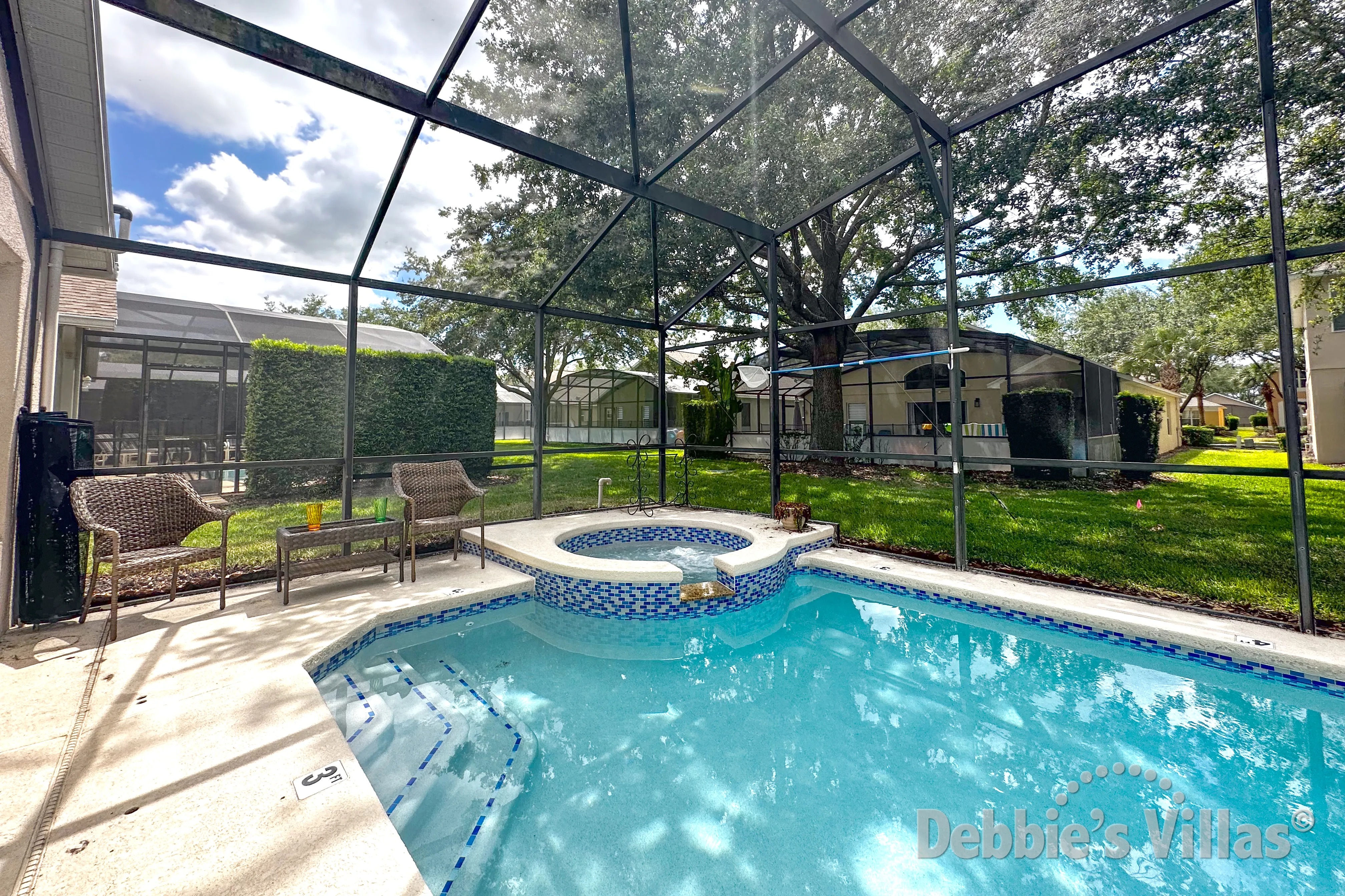 West-facing pool and spa at this vacation villa on Emerald Island in Kissimmee