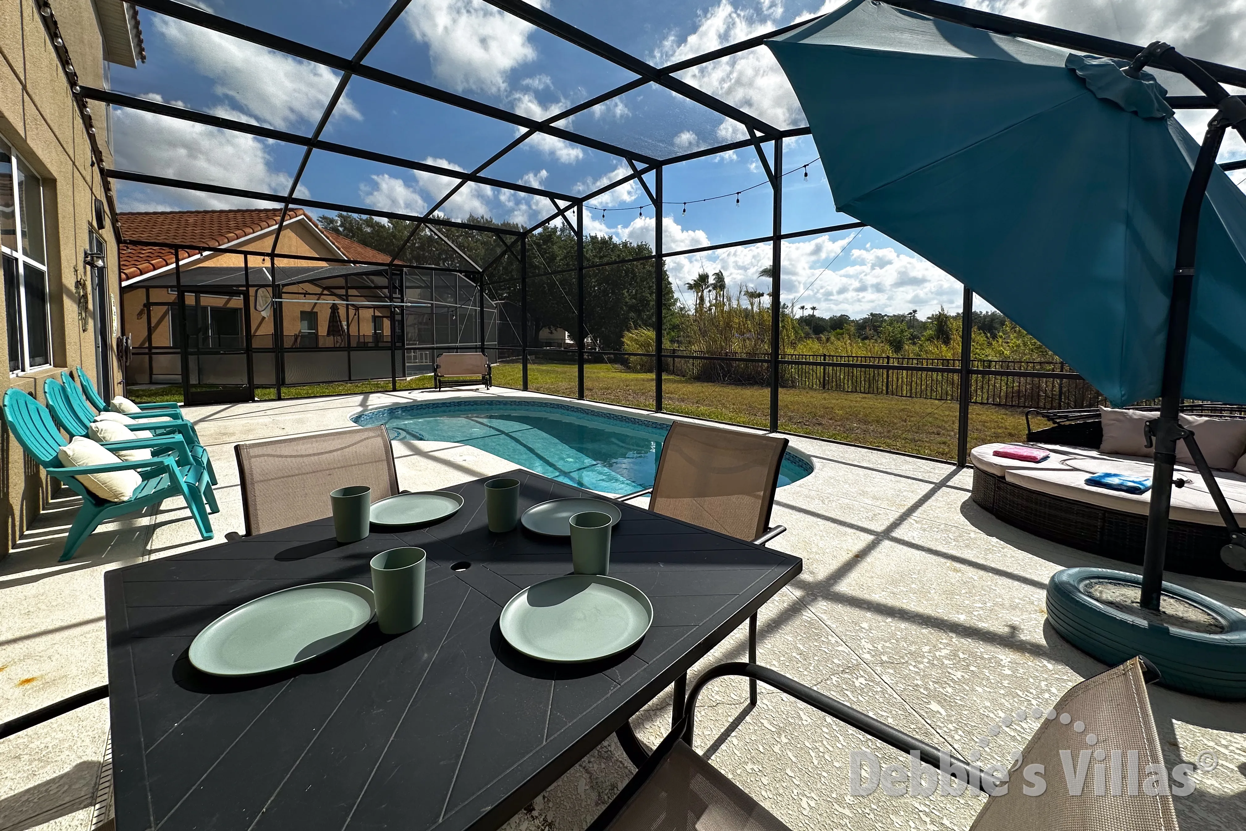 Have a chilled drink and snack at the poolside table