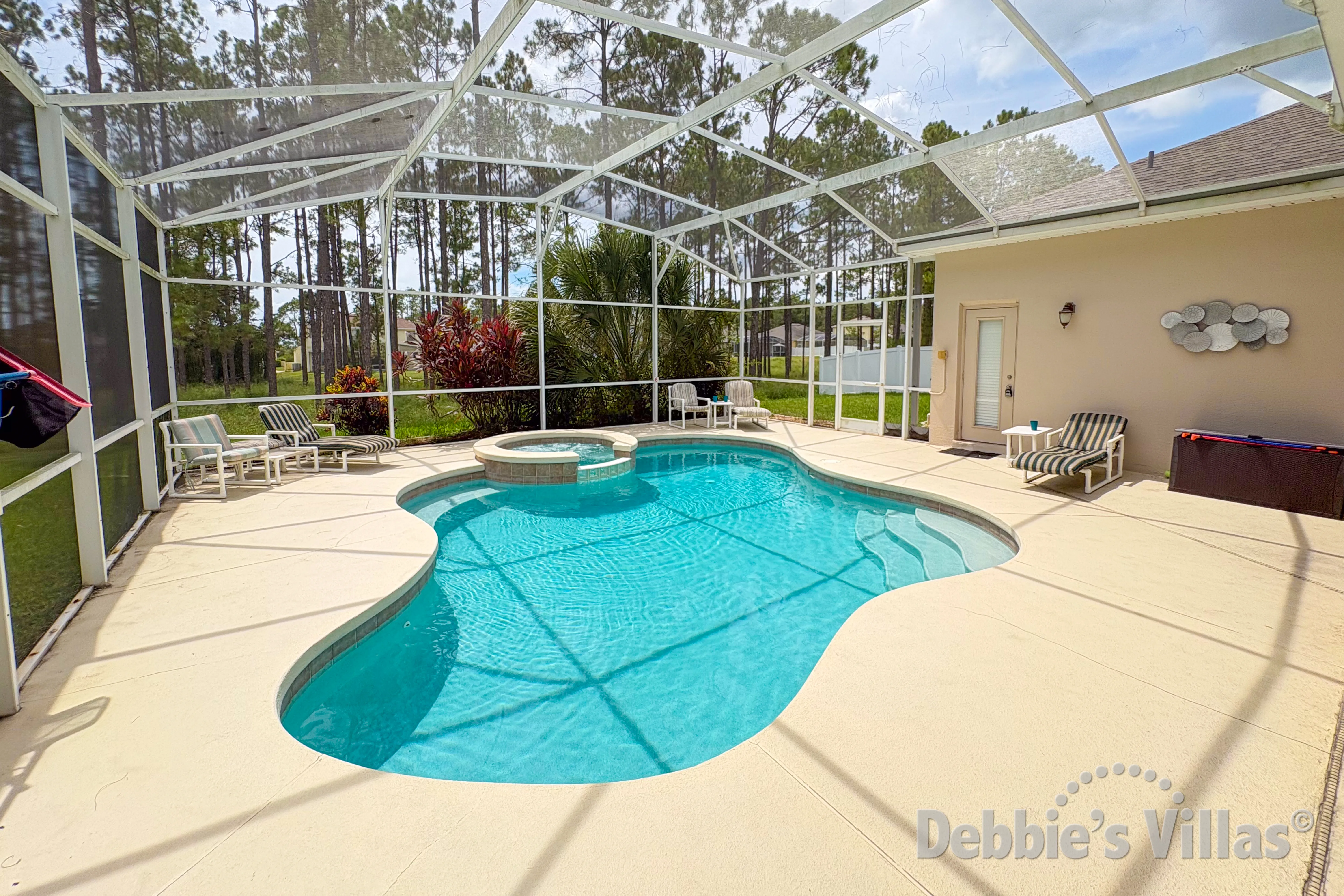 West-facing private pool and spa at this vacation villa on Highlands Reserve in Davenport