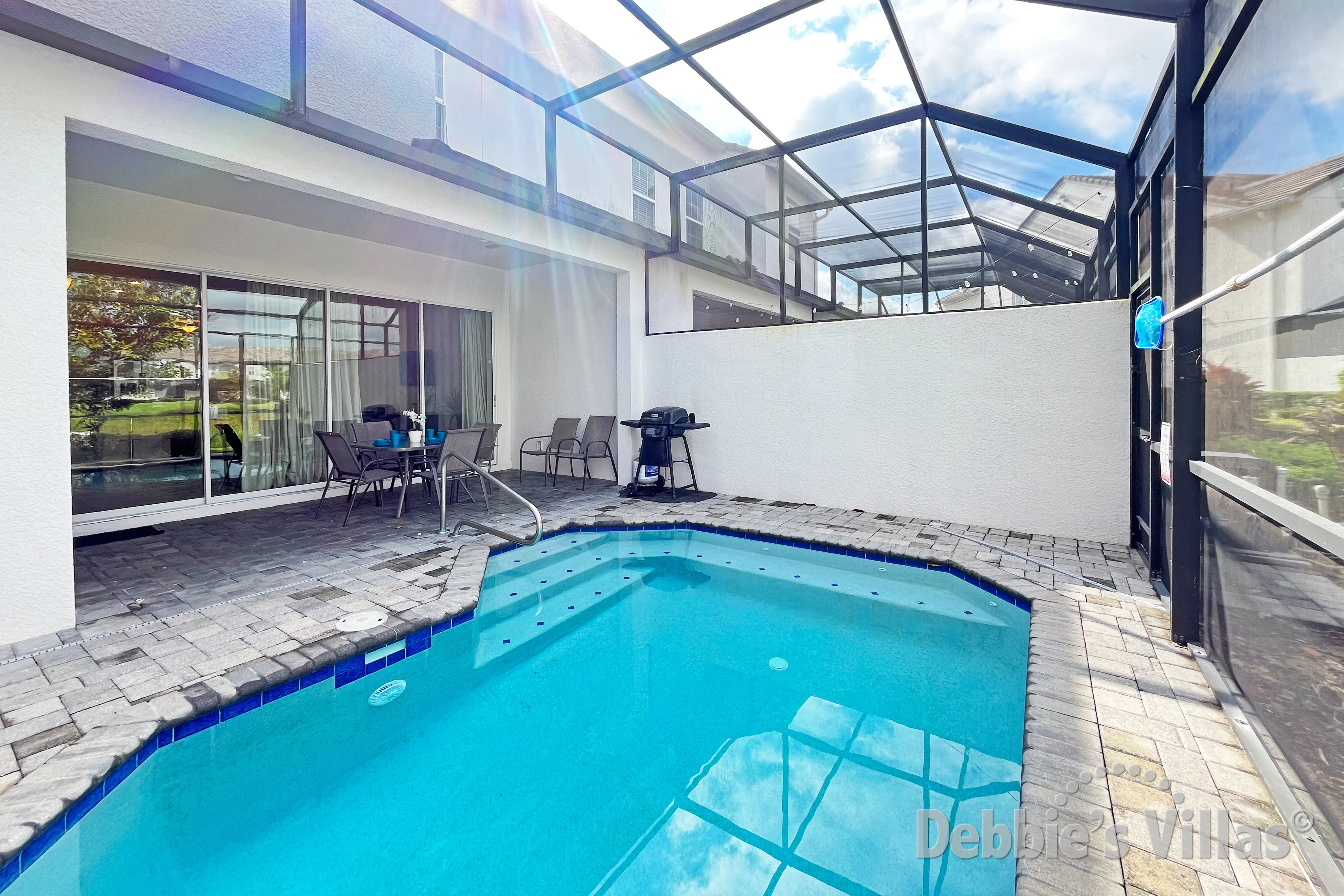 Private west-facing pool deck with complementary gas BBQ grill