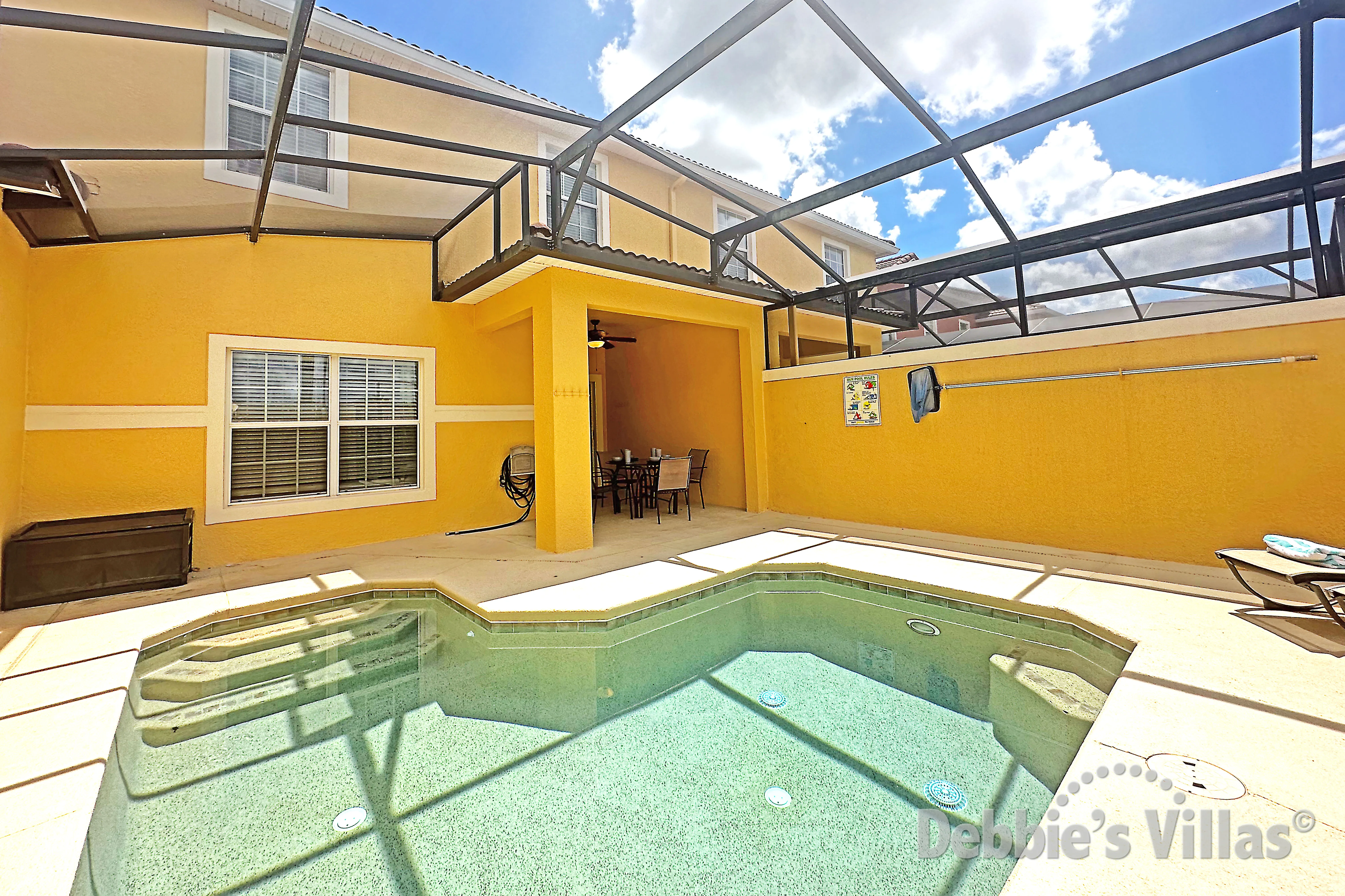 Private west-facing splash pool at this vacation home on Paradise Palms in Kissimmee