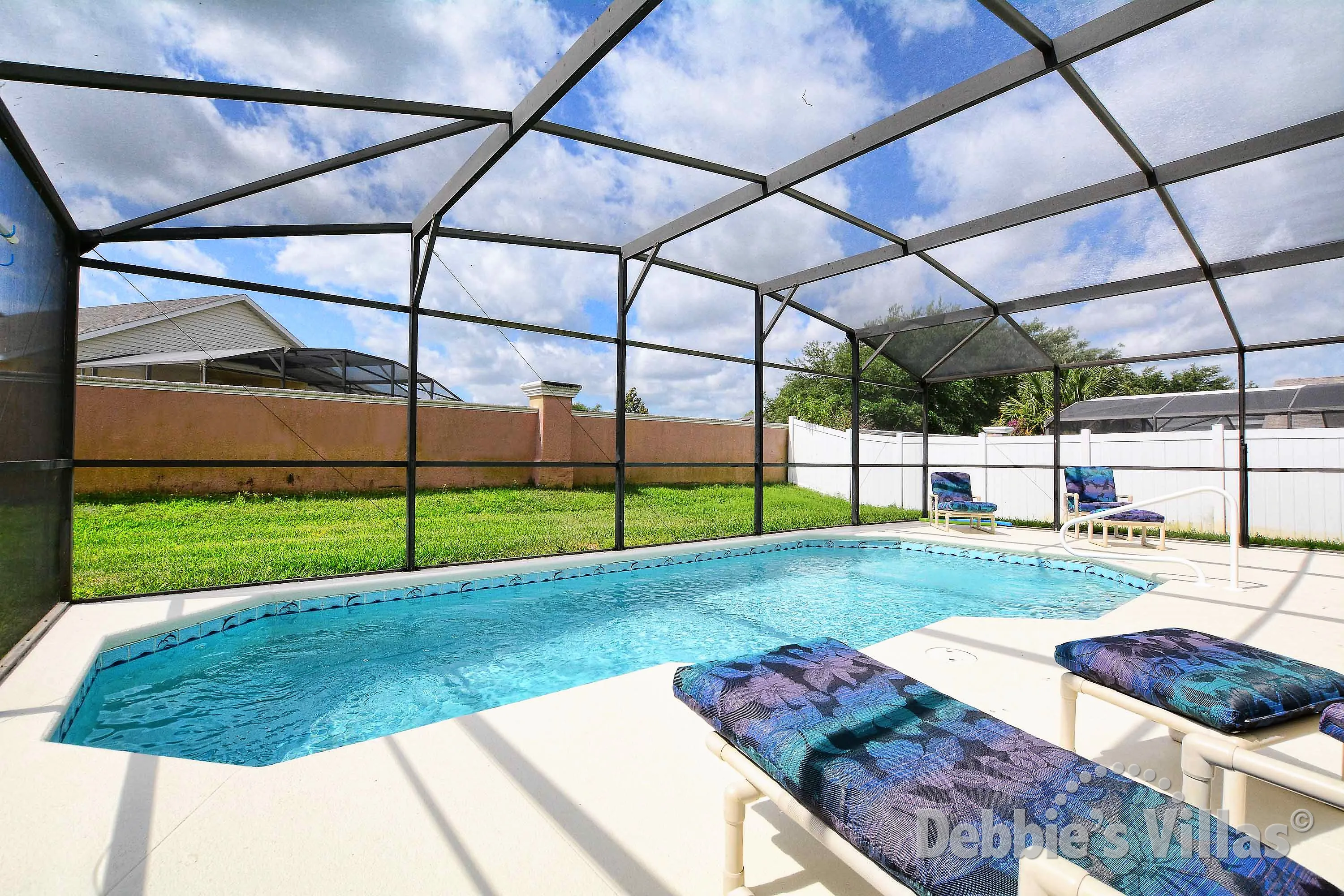 Soak up the sun and chill with a book or two on the pool deck of this Kissimmee vacation villa