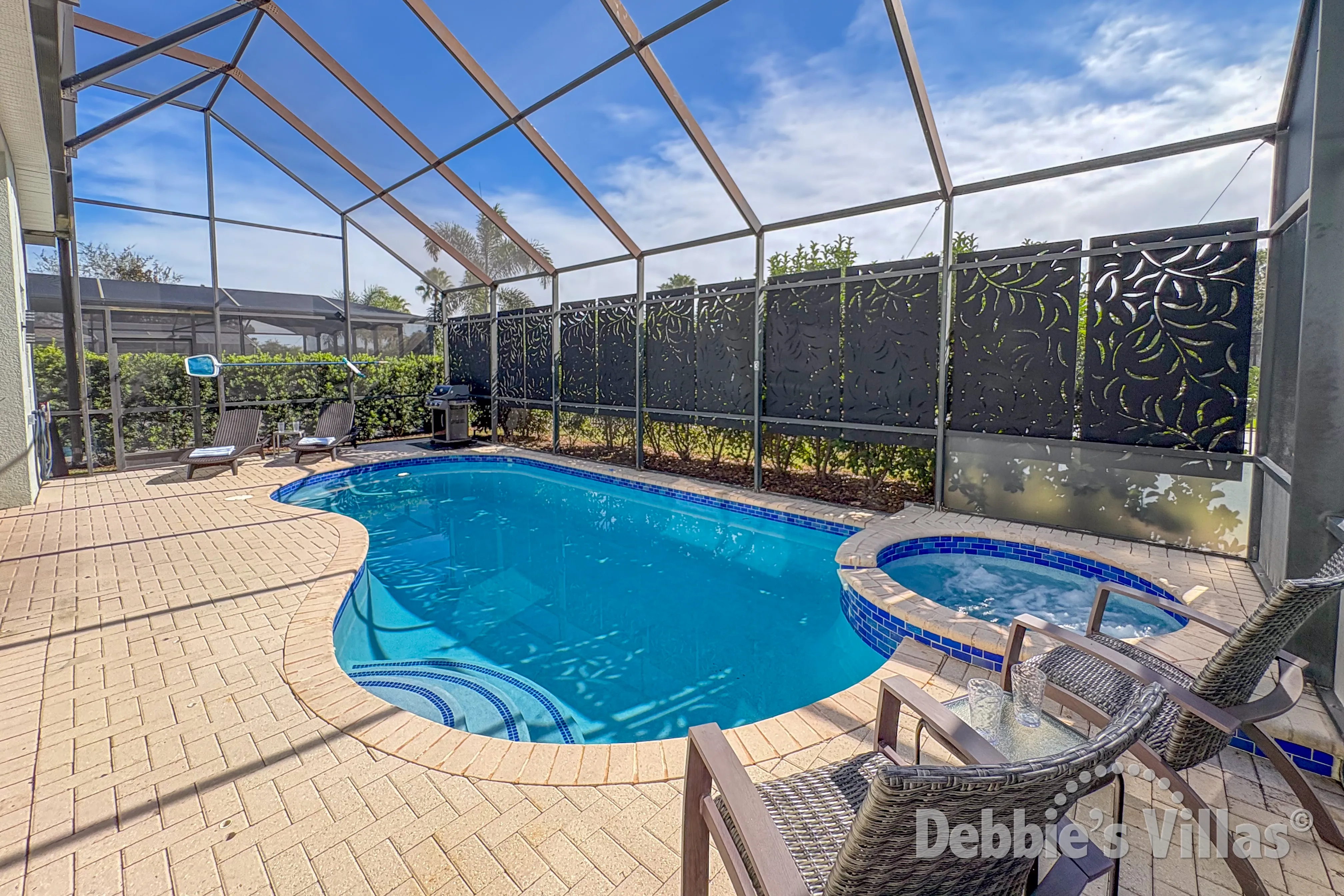 South-facing pool and spa at this vacation villa on Windsor Hills in Kissimmee 