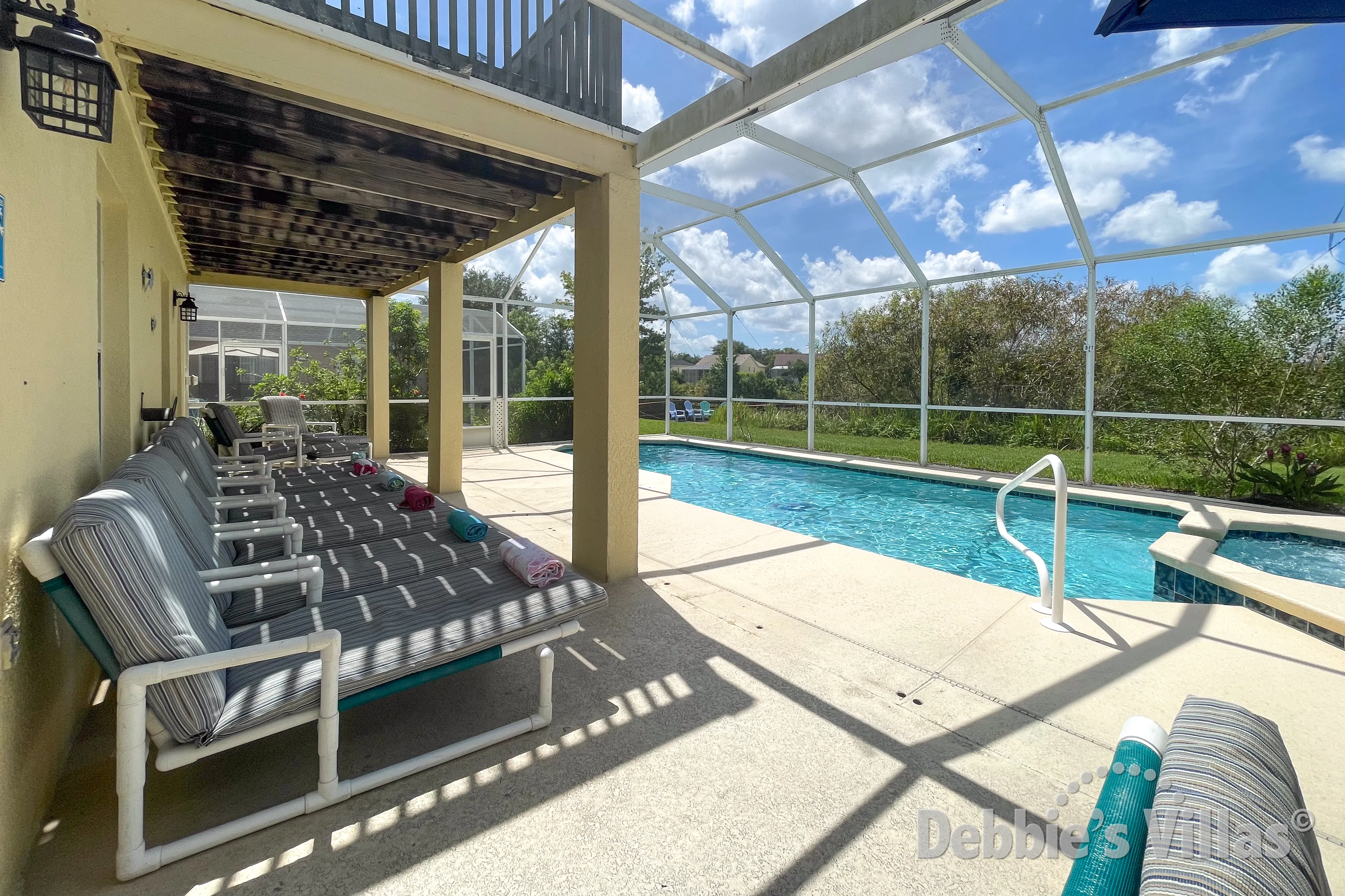 South-facing pool and spa at this vacation villa on Resort at Town Center in Davenport 