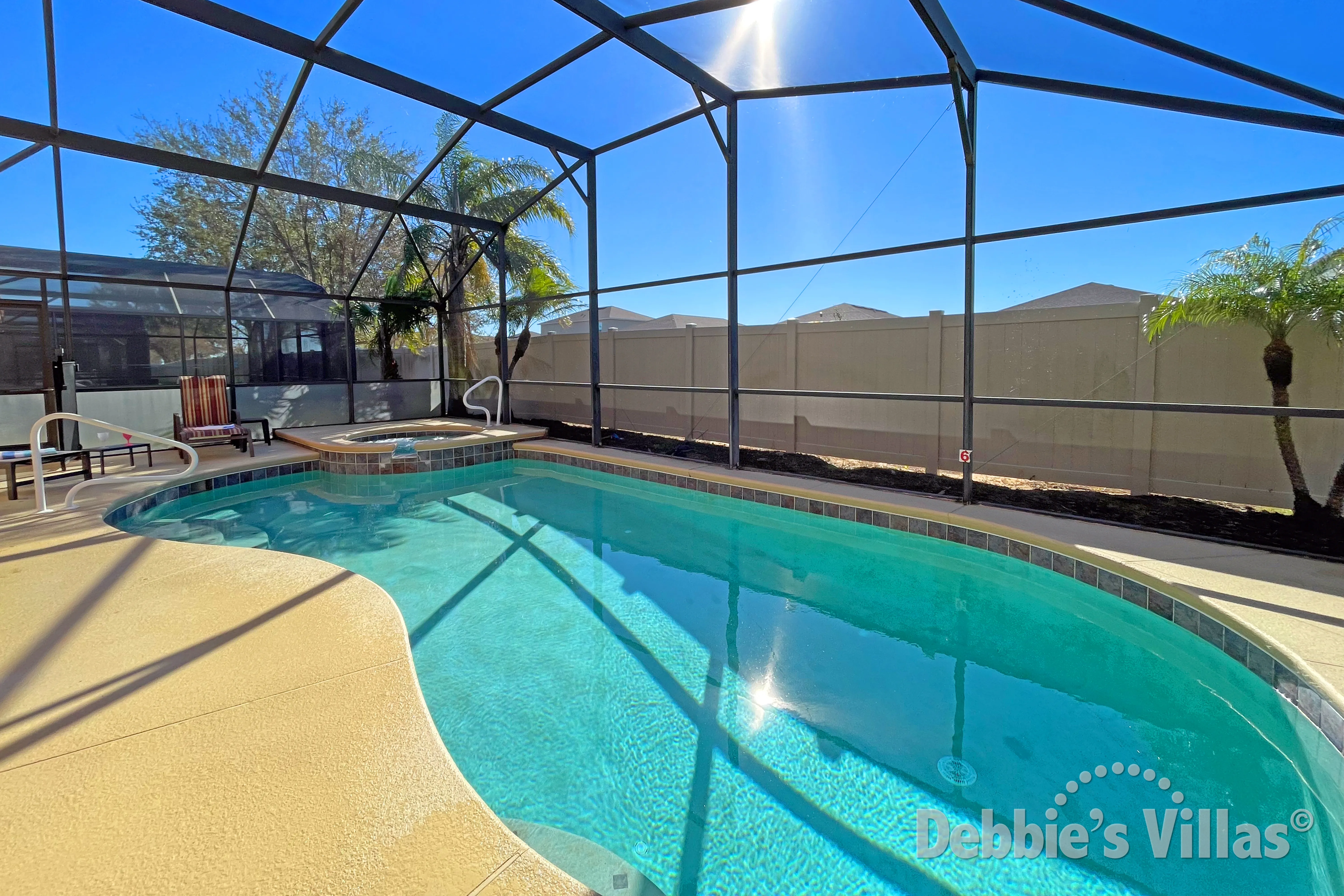 South-facing pool and spa at this vacation villa on Solana in Davenport