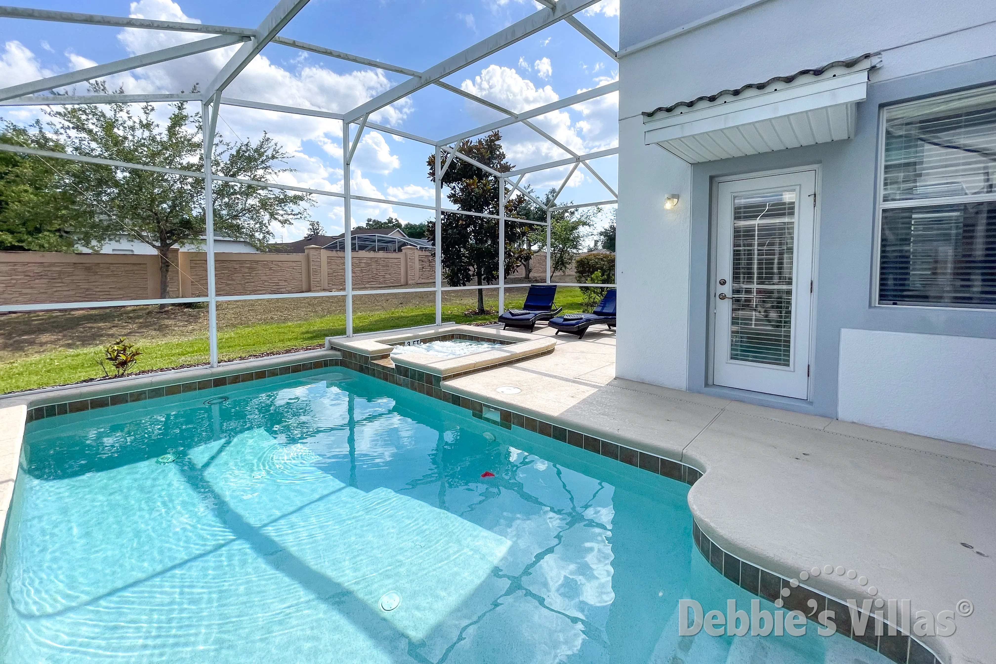 Sunny south-facing pool and spa at this ChampionsGate vacation villa