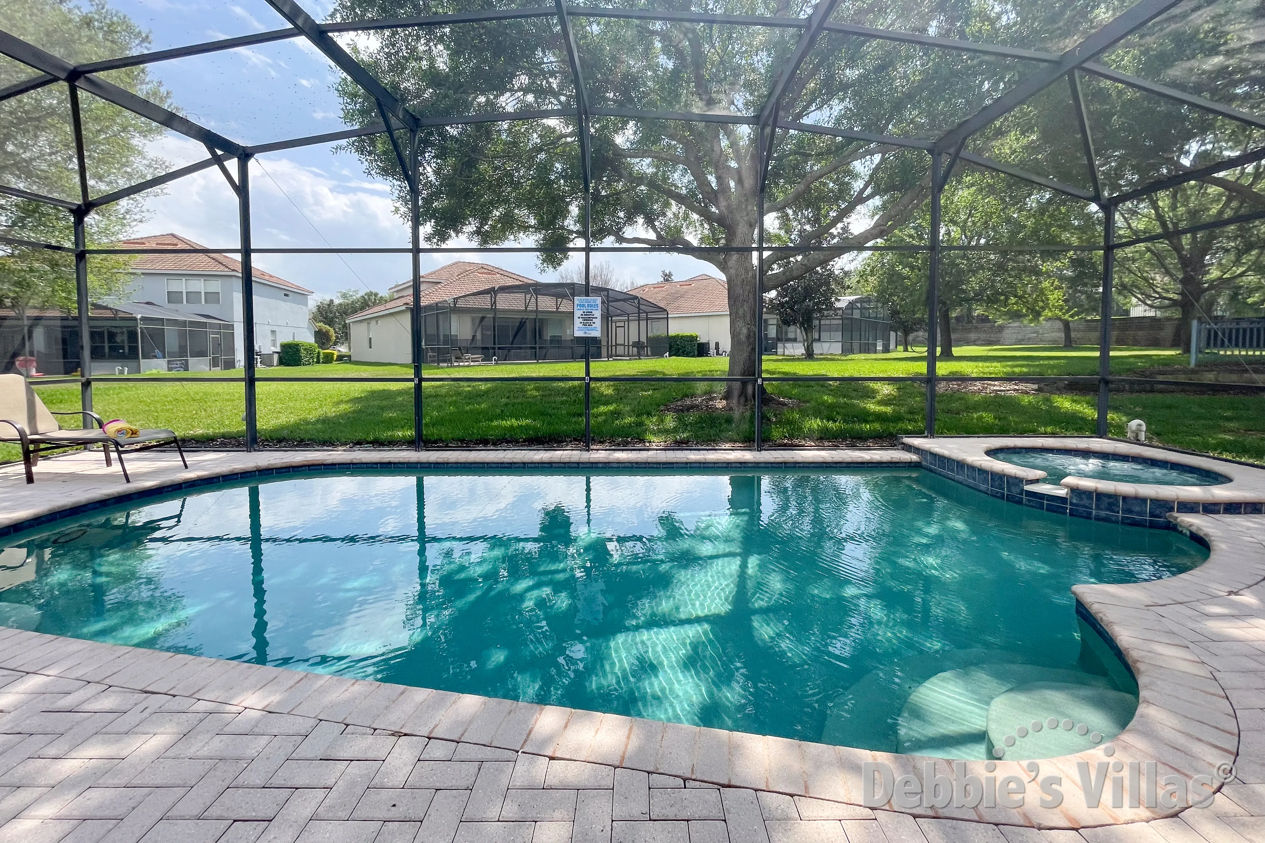 South-facing pool and spa at this vacation villa on Windsor Hills in Kissimmee