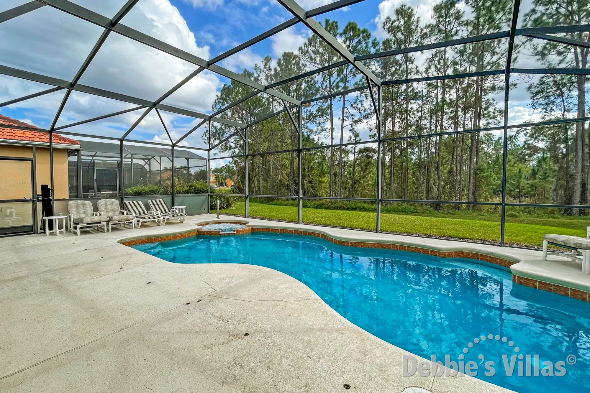 Scenic views from the south-facing pool and spa of this vacation villa on Watersong