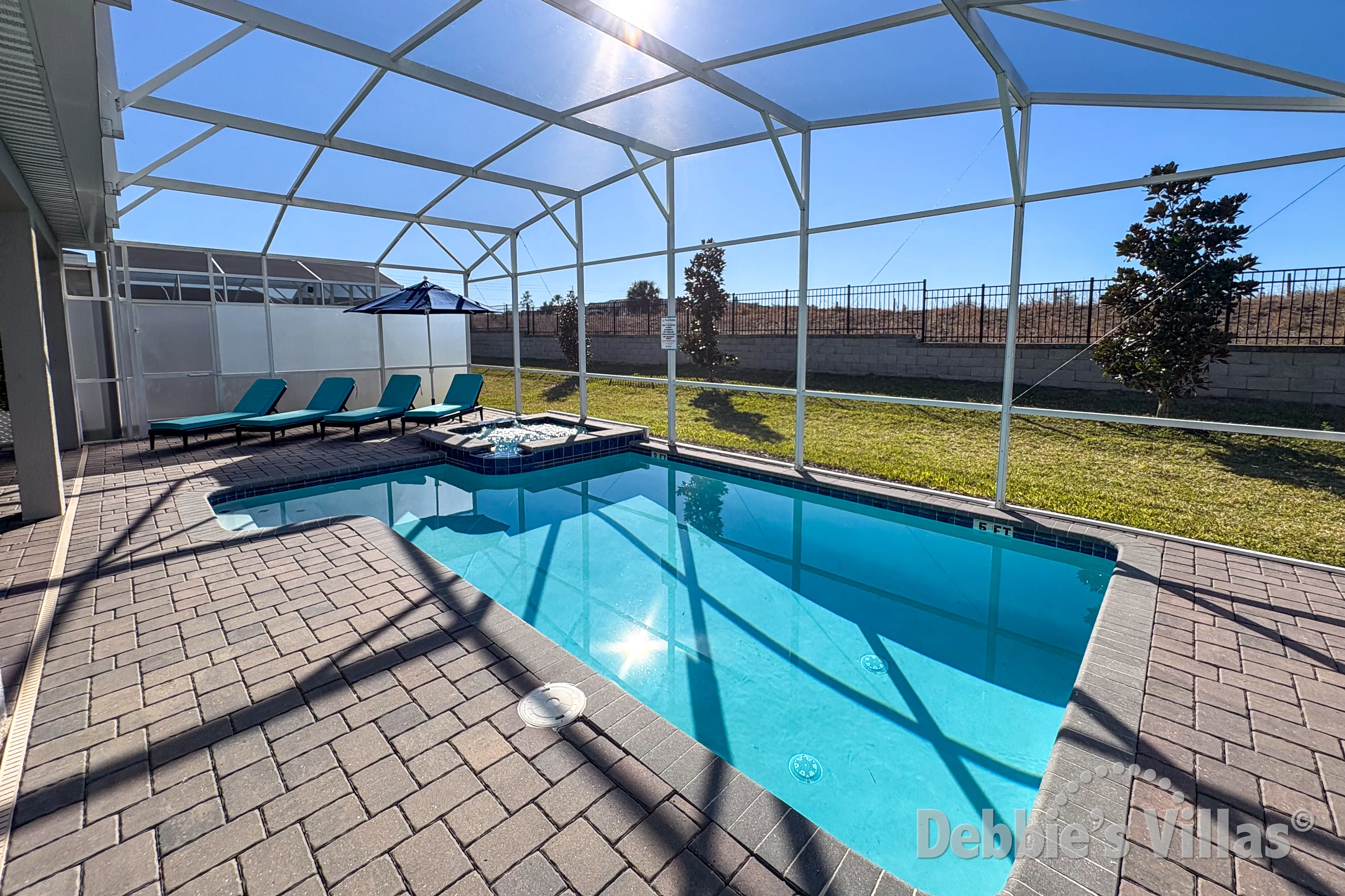 West-facing pool and spa at this Orlando vacation villa on ChampionsGate in Davenport 