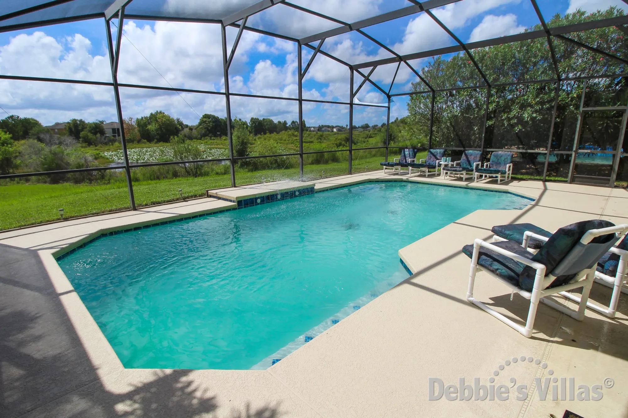South-facing pool with lake view at this West Haven villa