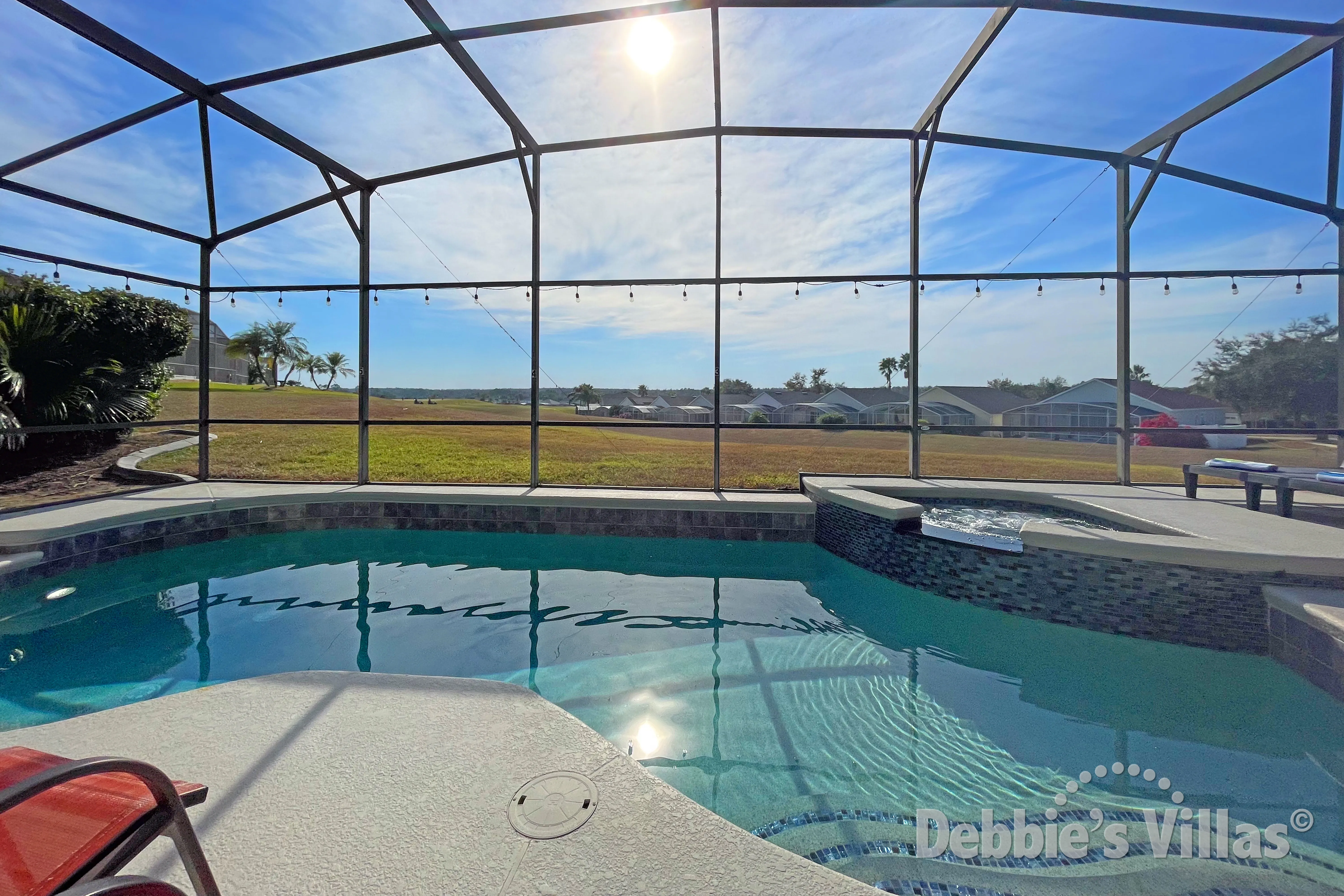 Southwest-facing pool and spa at this vacation villa on Highlands Reserve in Davenport