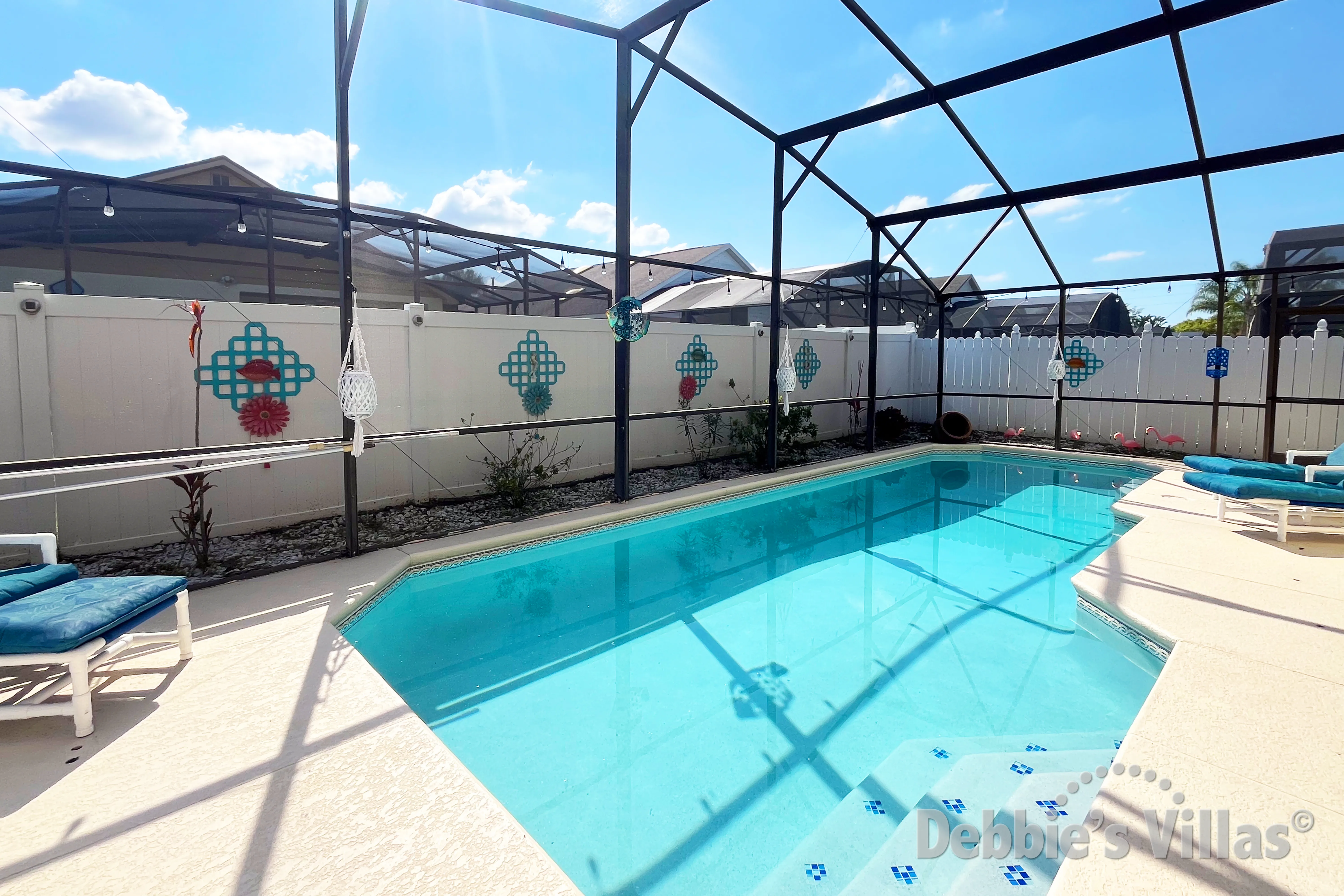 Southeast-facing pool and spa at this vacation villa on Indian Creek in Kissimmee