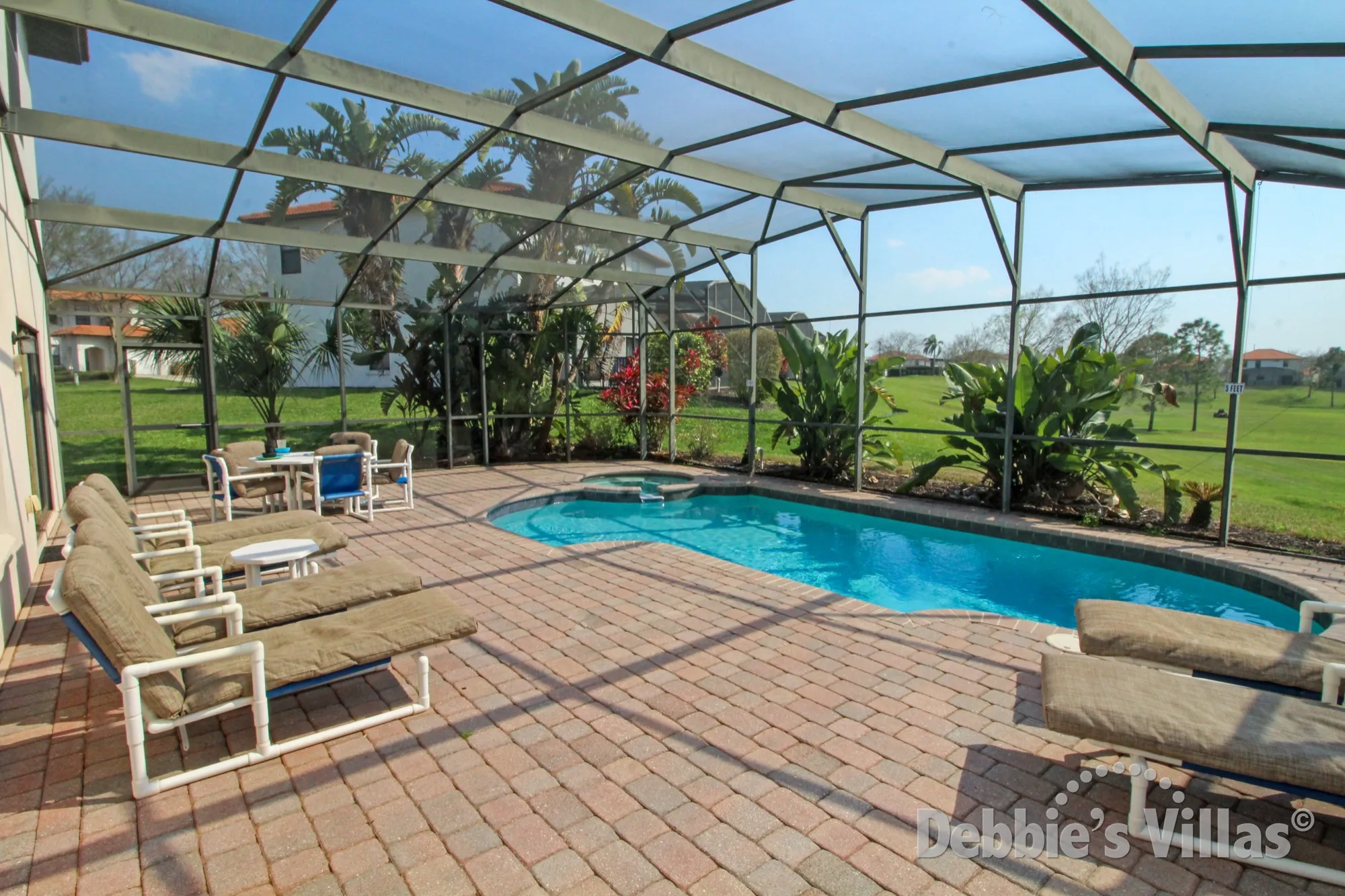 Vacation villa on a gated Clermont community with a private south-facing pool and spa