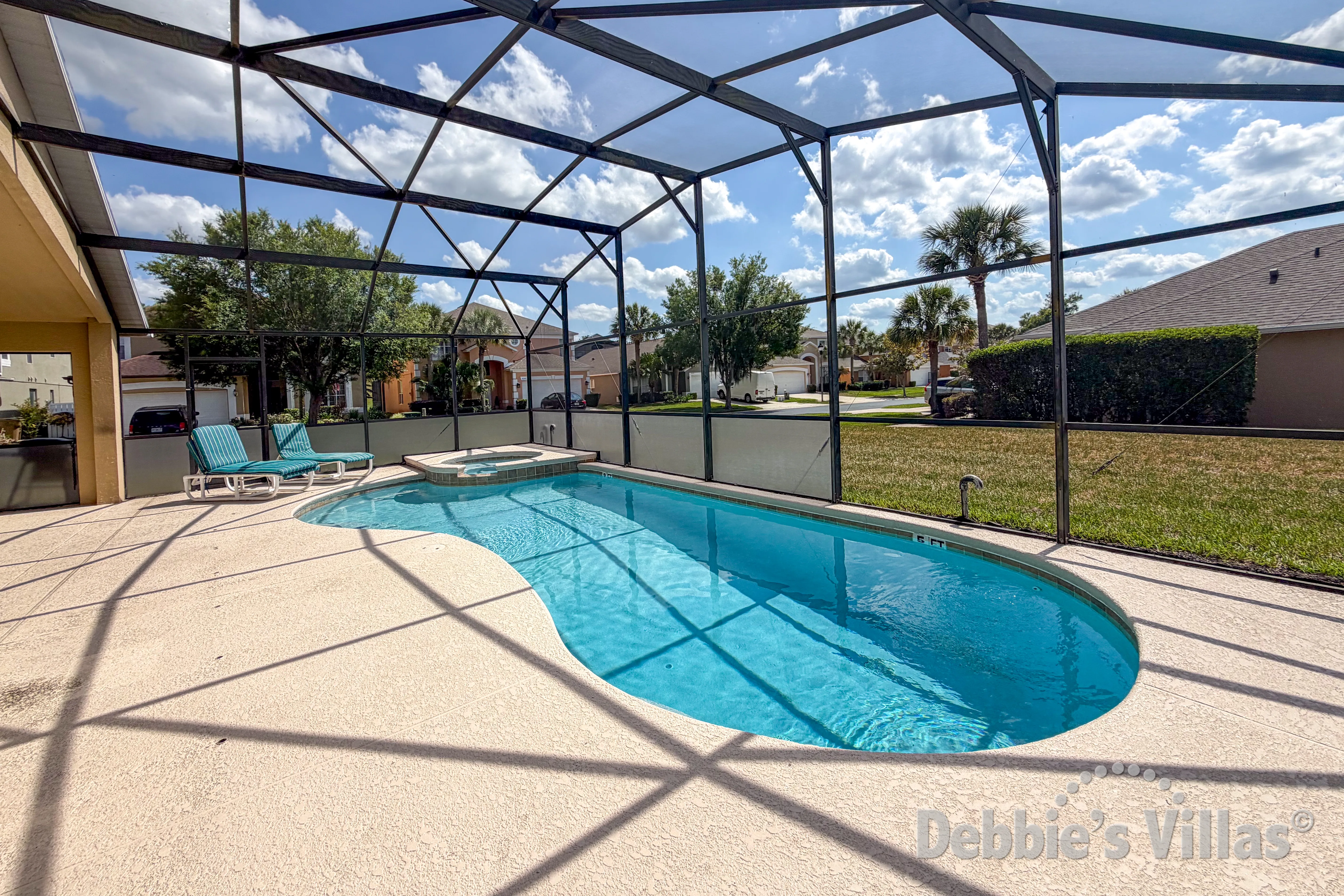 West-facing pool and spa at this vacation villa on Emerald Island in Kissimmee 