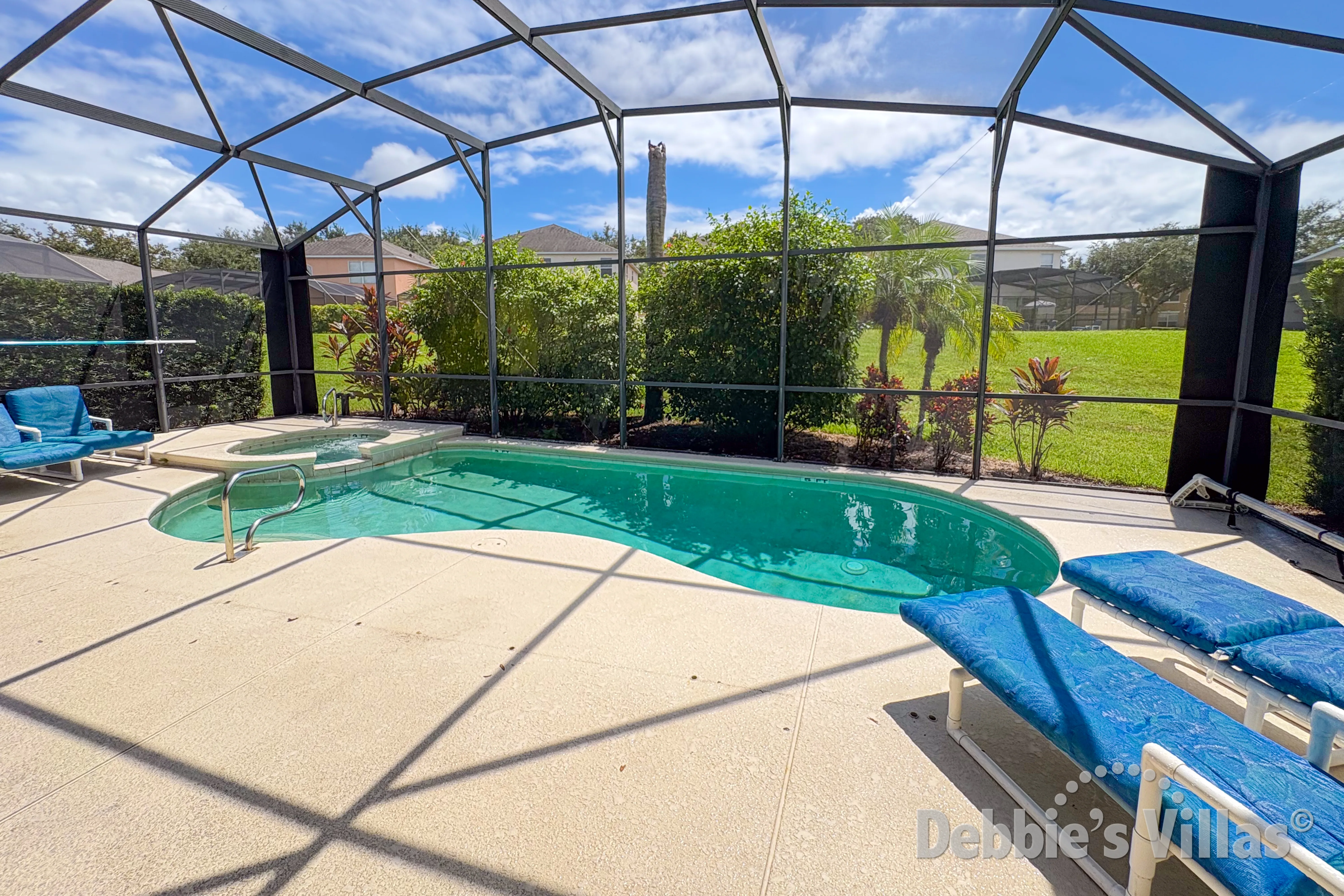 South-facing pool and spa at this vacation villa on Emerald Island in Kissimmee 