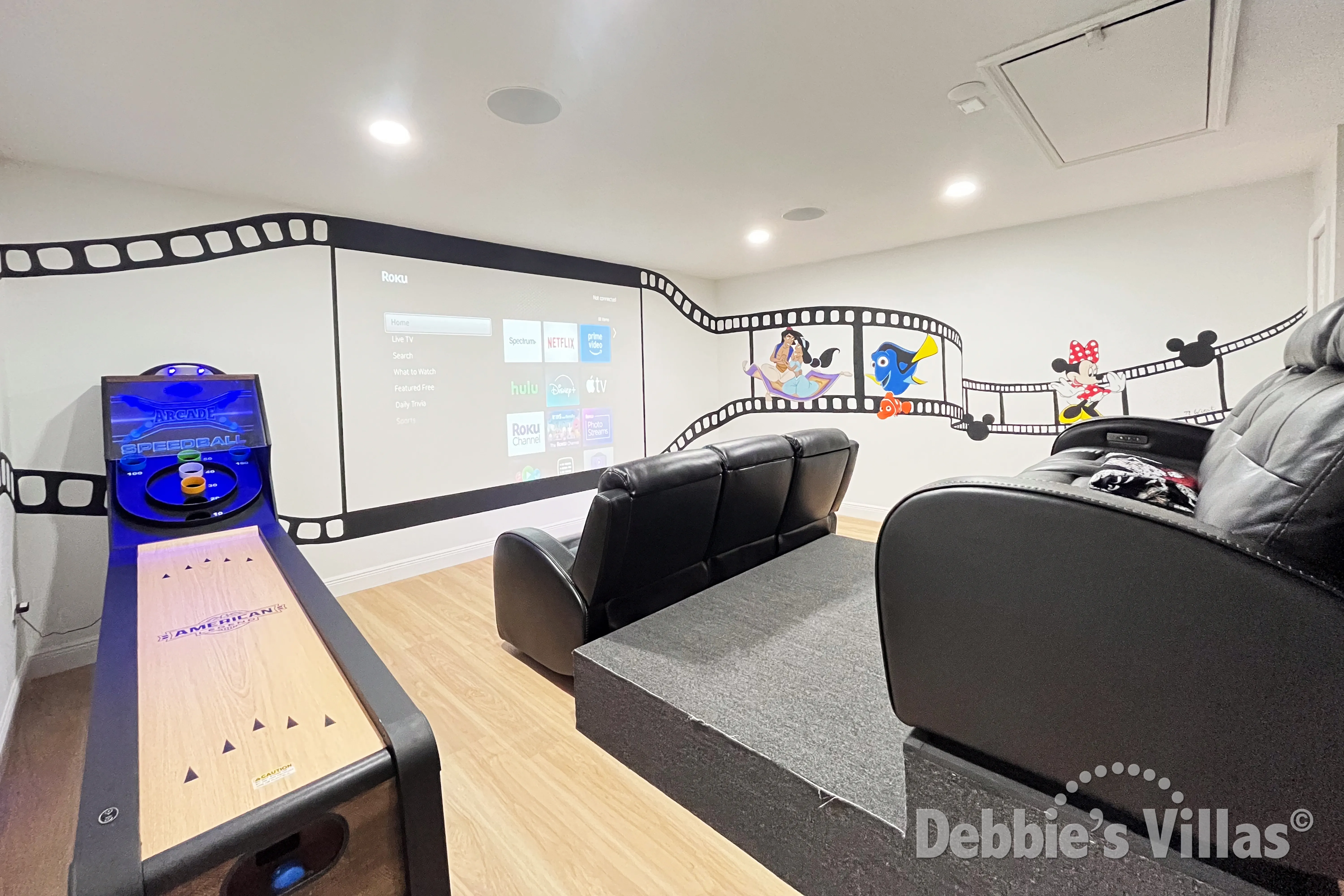 Plenty of seating in the home cinema room at this Kissimmee vacation villa