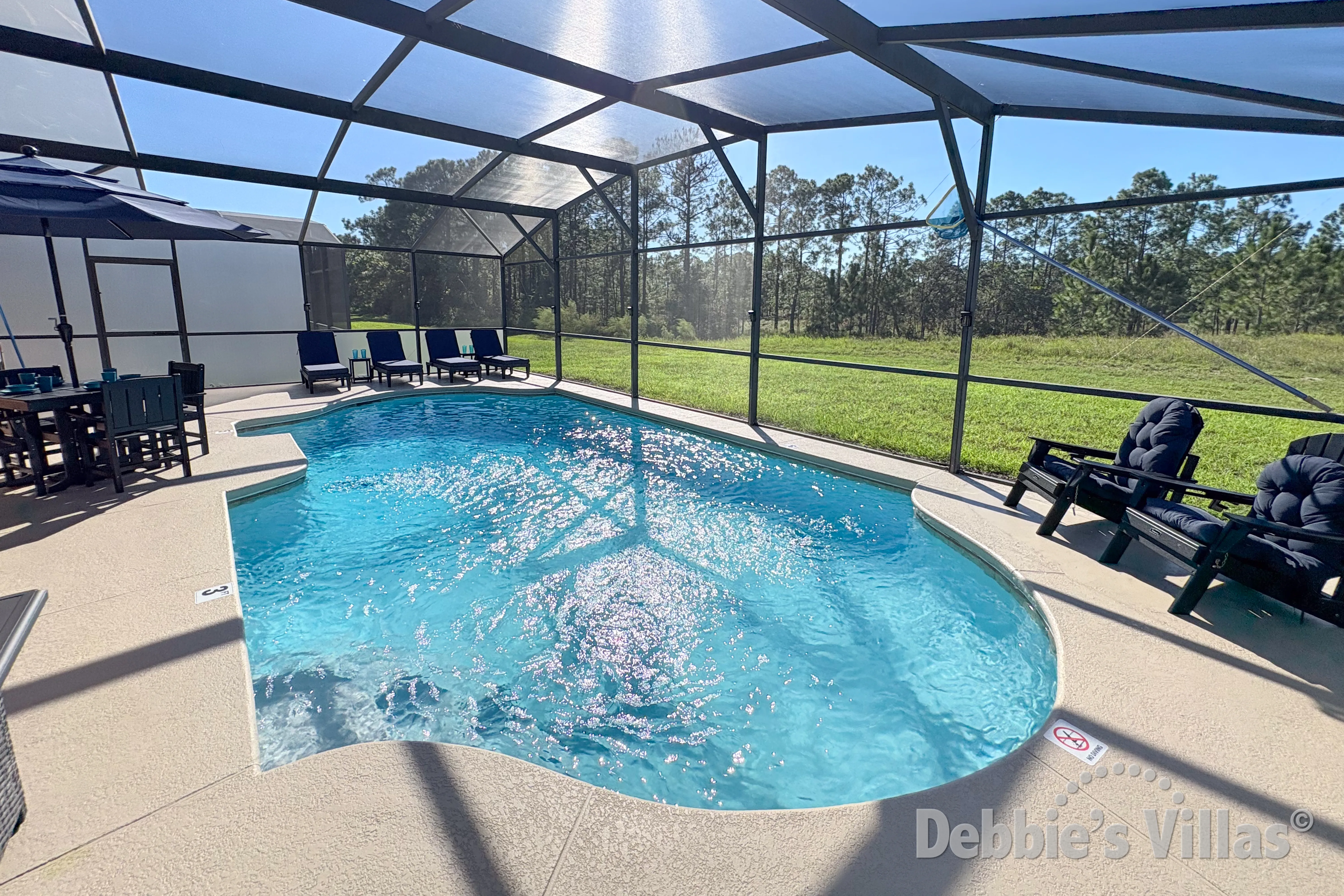 West-facing pool at this vacation villa on Watersong in Davenport 