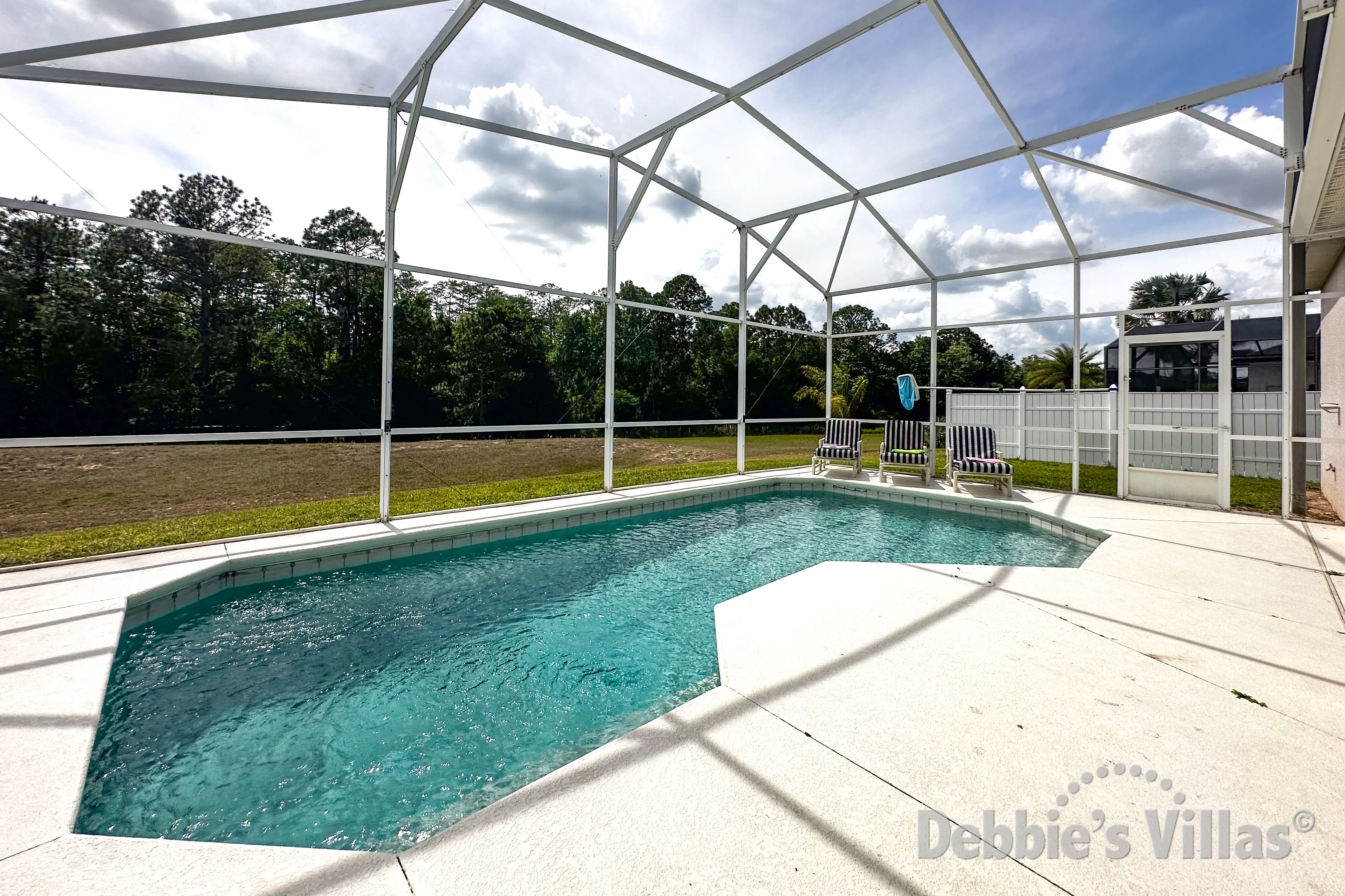 West-facing pool at this vacation villa on Highlands Reserve in Davenport