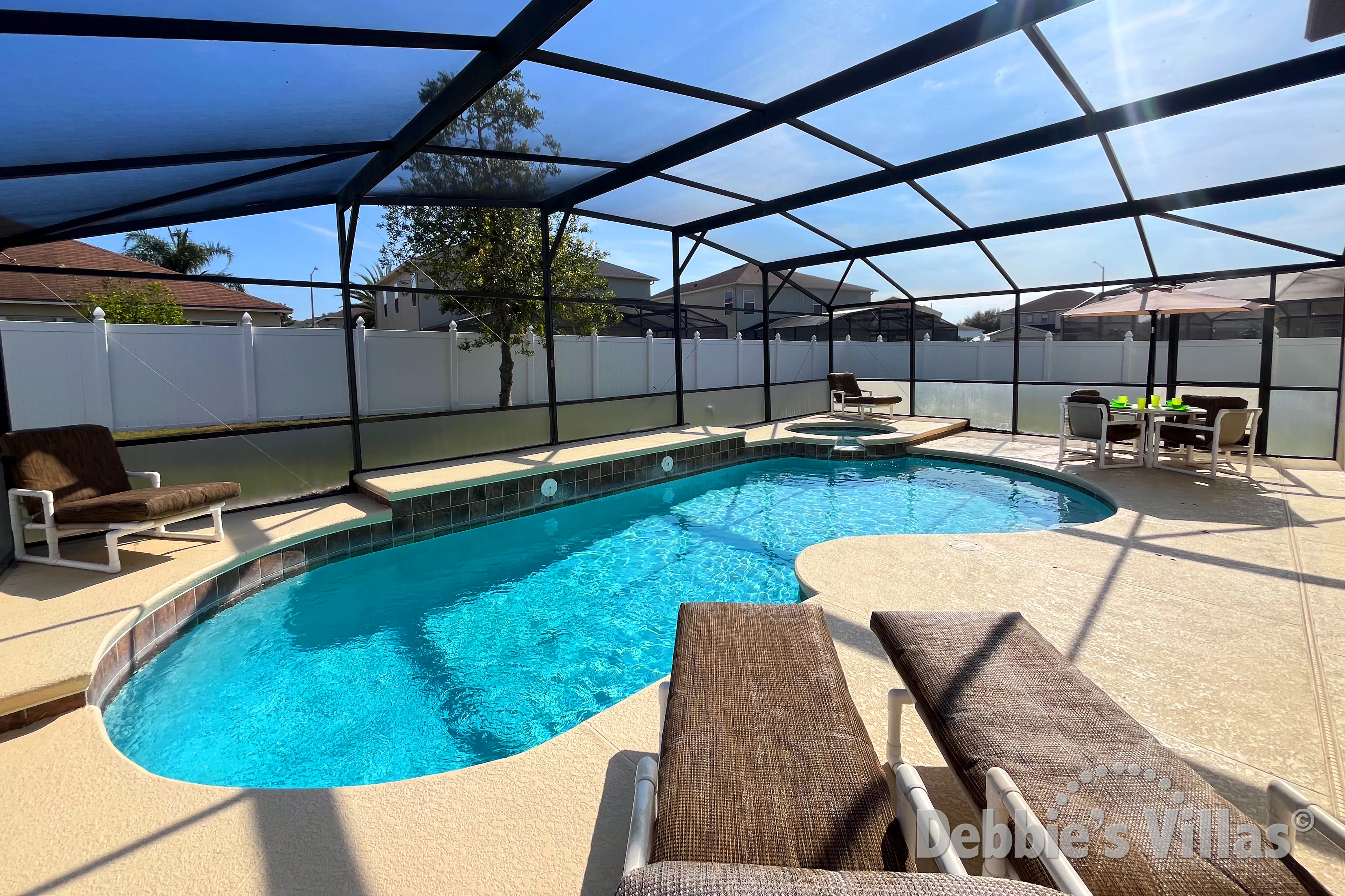 Sun-drenched private pool and spa at this vacation villa on Four Corners in Davenport