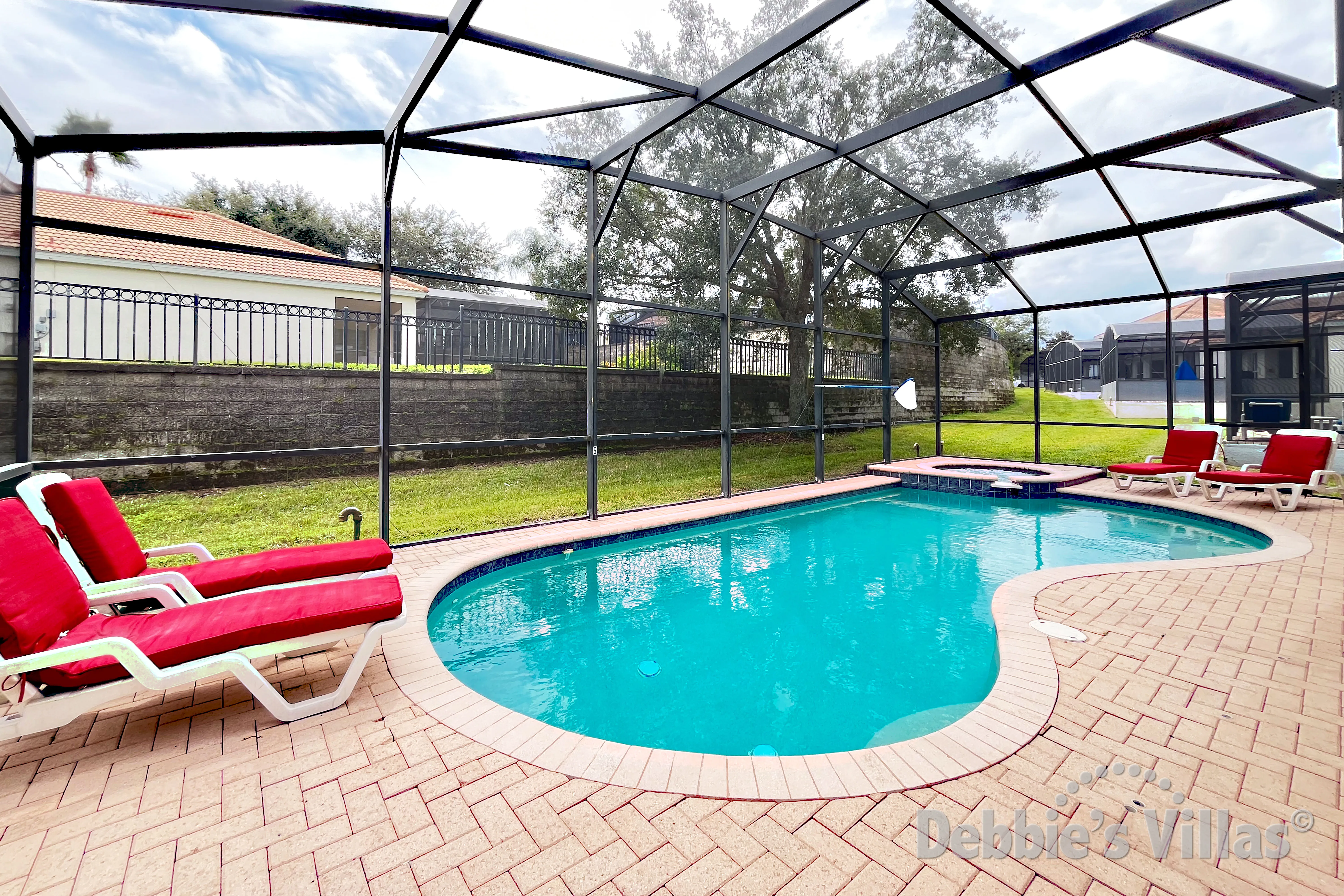 Southeast-facing pool and spa at this vacation villa on Windsor Hills in Kissimmee