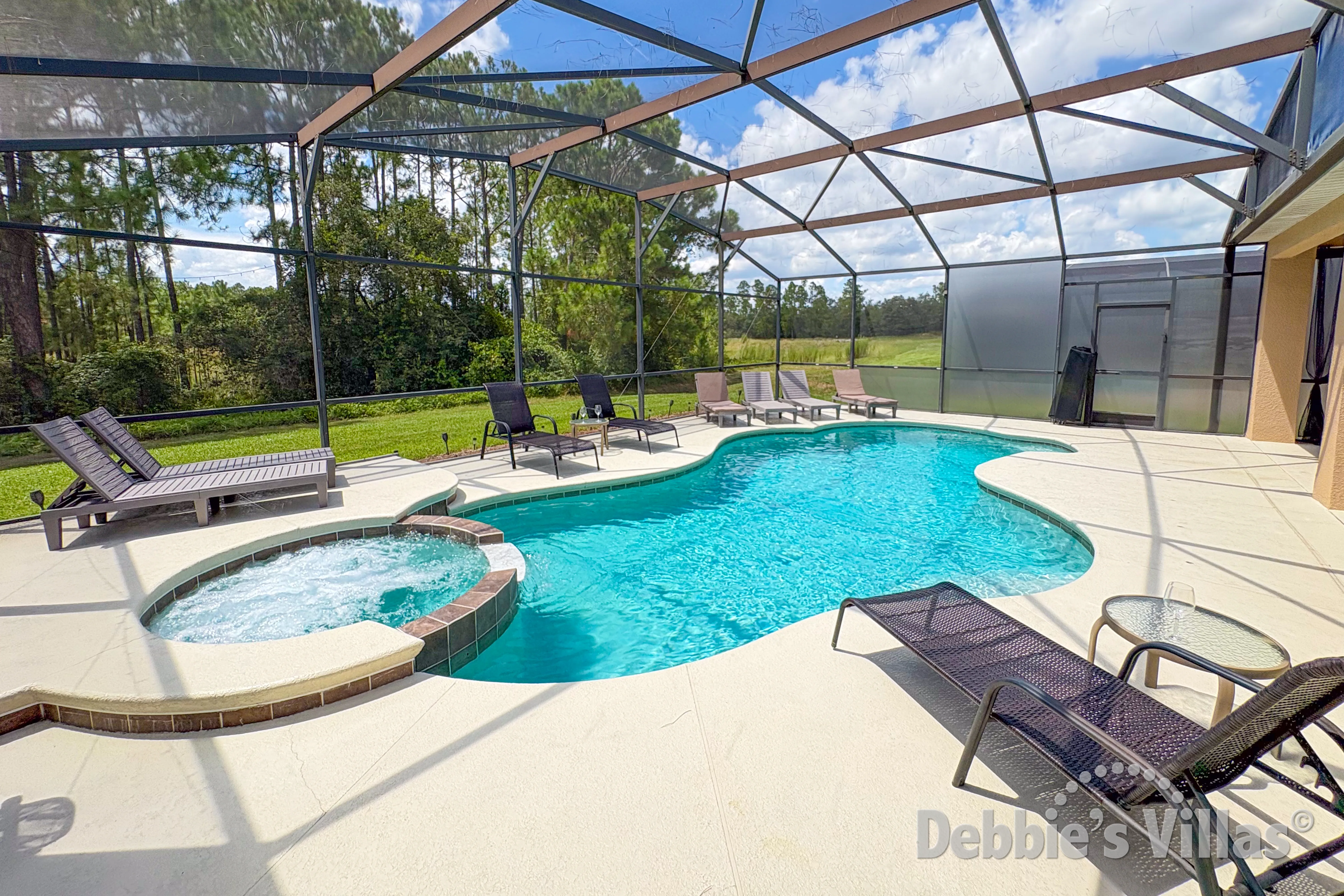 West-facing private pool and spa at this vacation villa on Watersong in Davenport  