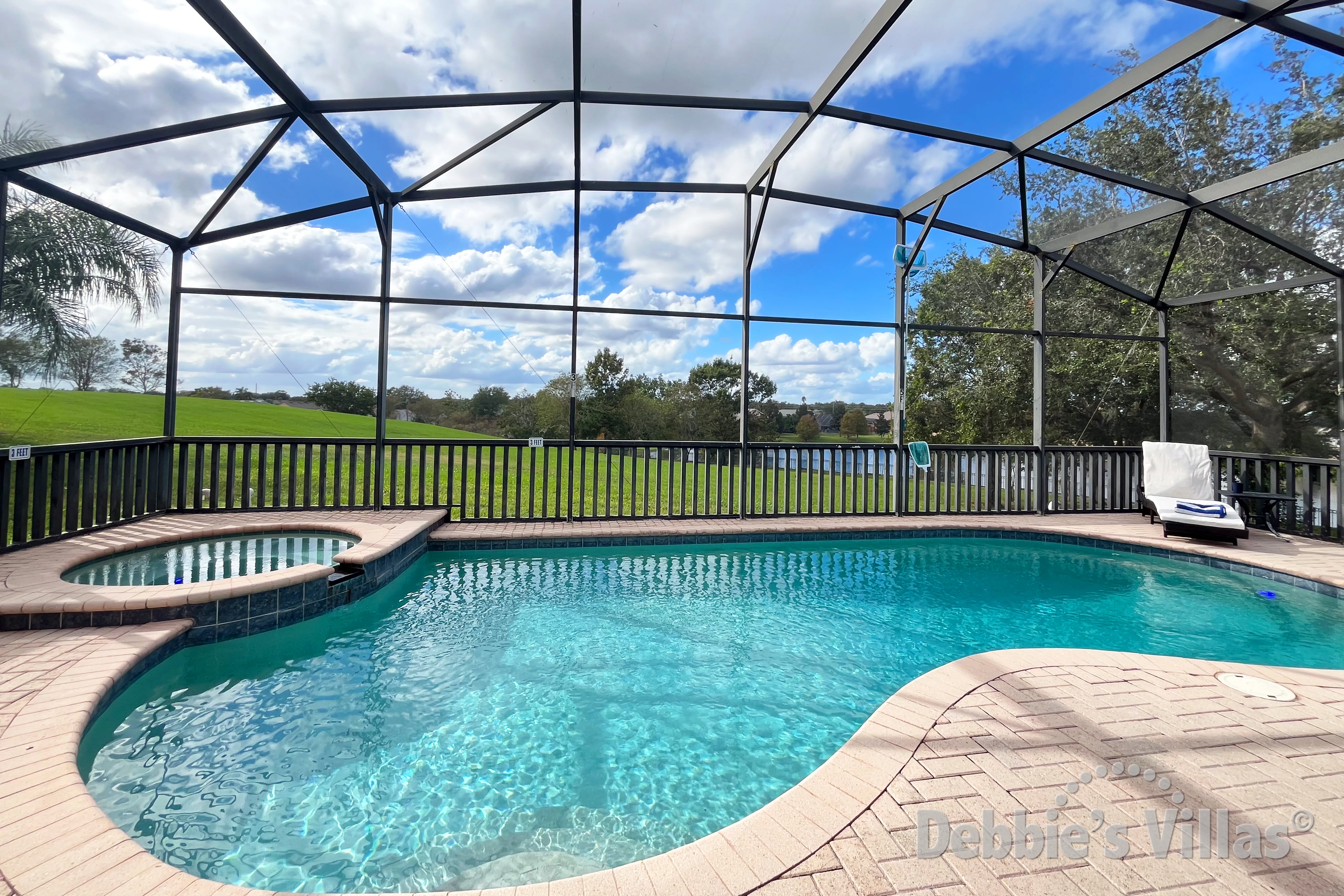 West-facing pool and spa with scenic views at this vacation villa on Windsor Hills in Kissimmee