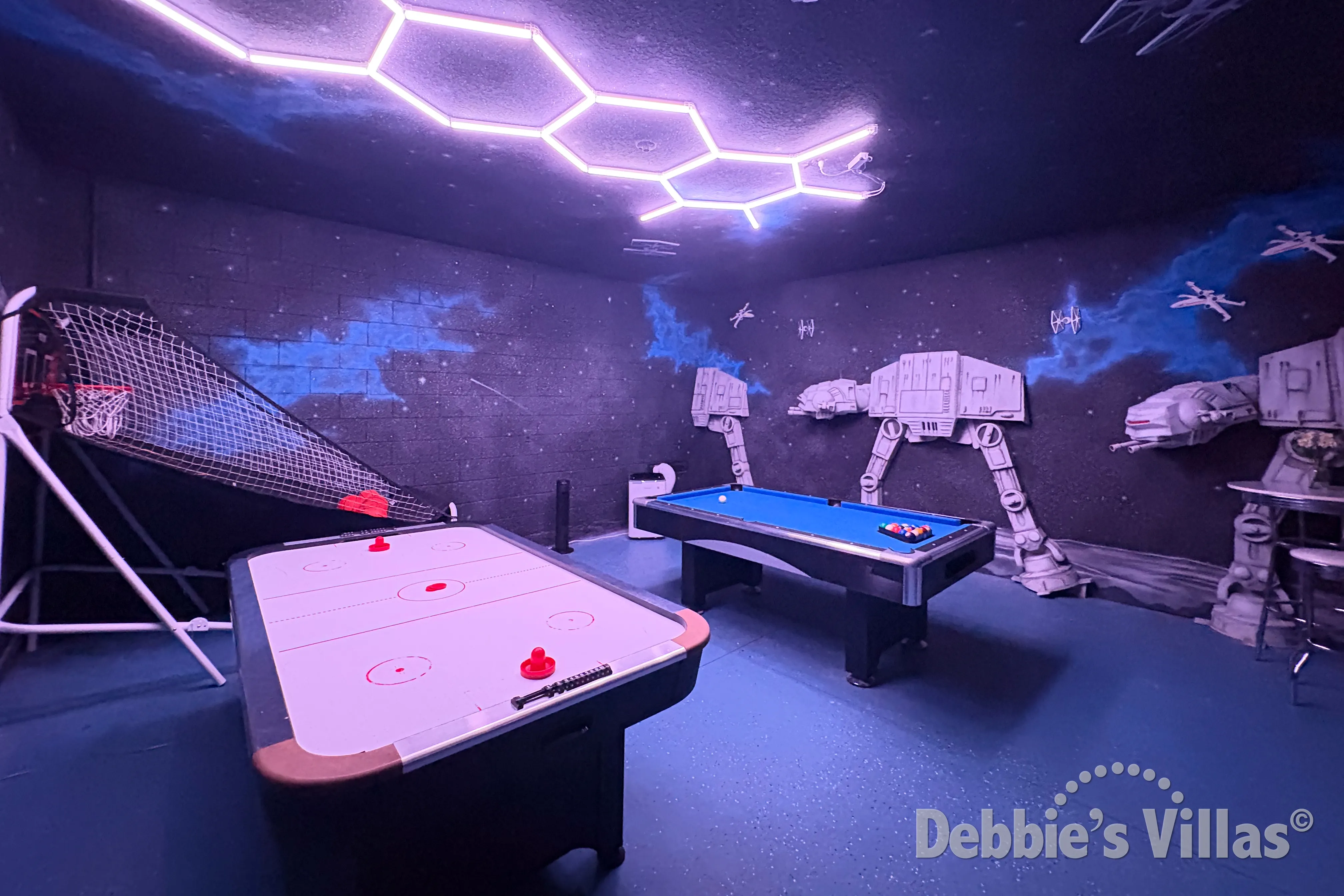 Air-conditioned games room in this vacation villa on Solterra in Davenport