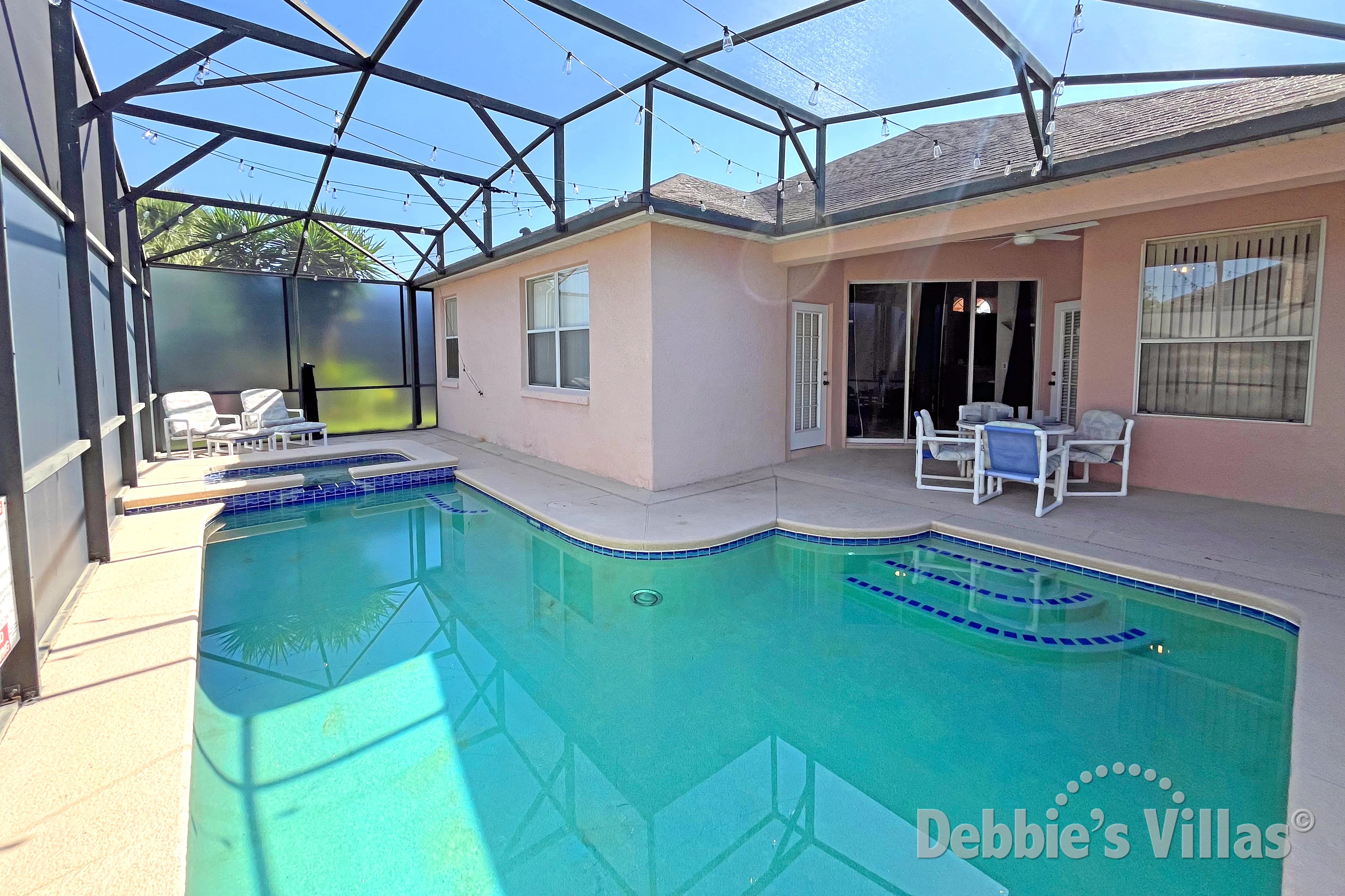 West-facing pool and spa at this vacation villa on Calabay Parc in Davenport 