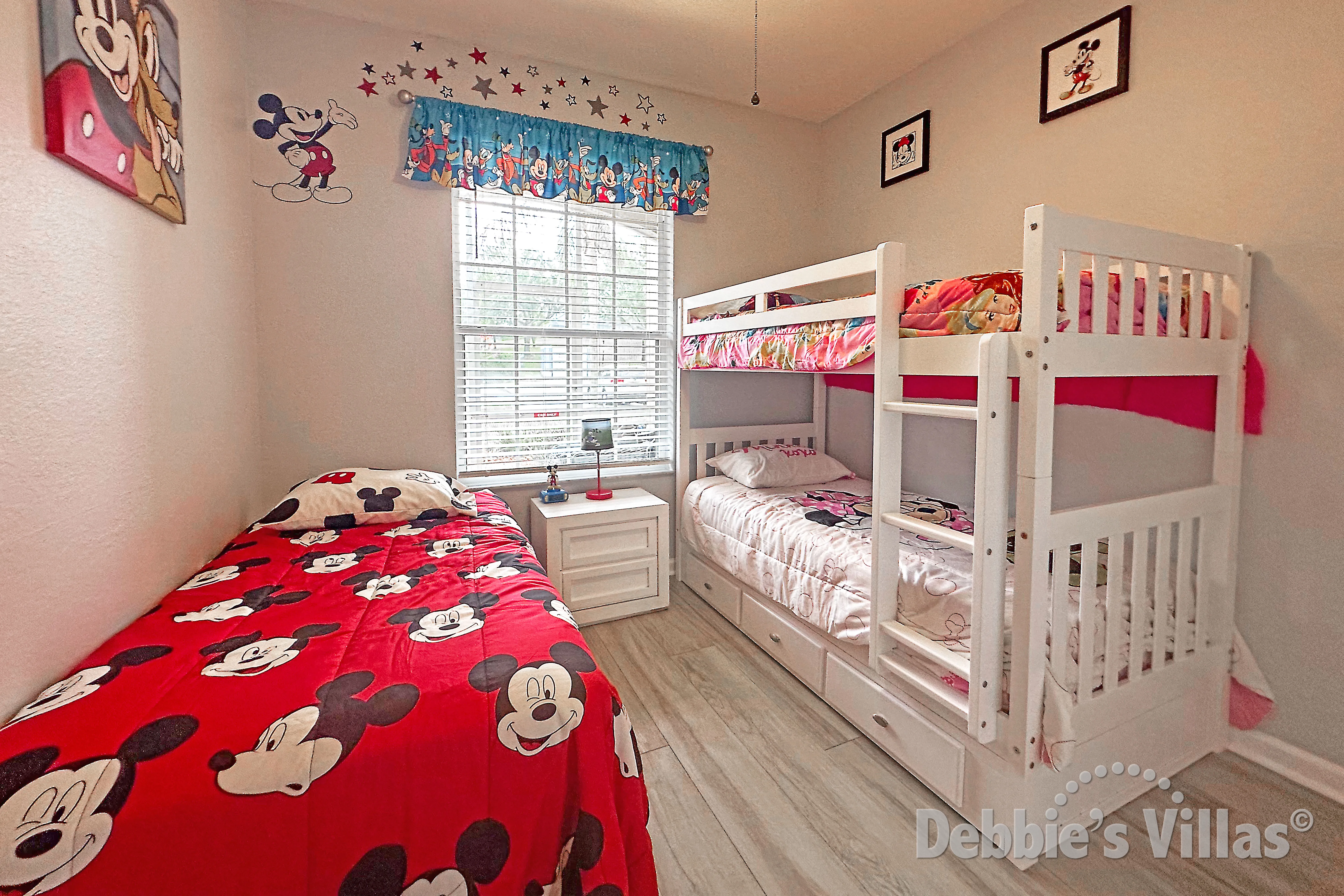 Single bed and Bunk beds in Mickey Mouse-themed Bedroom 3 