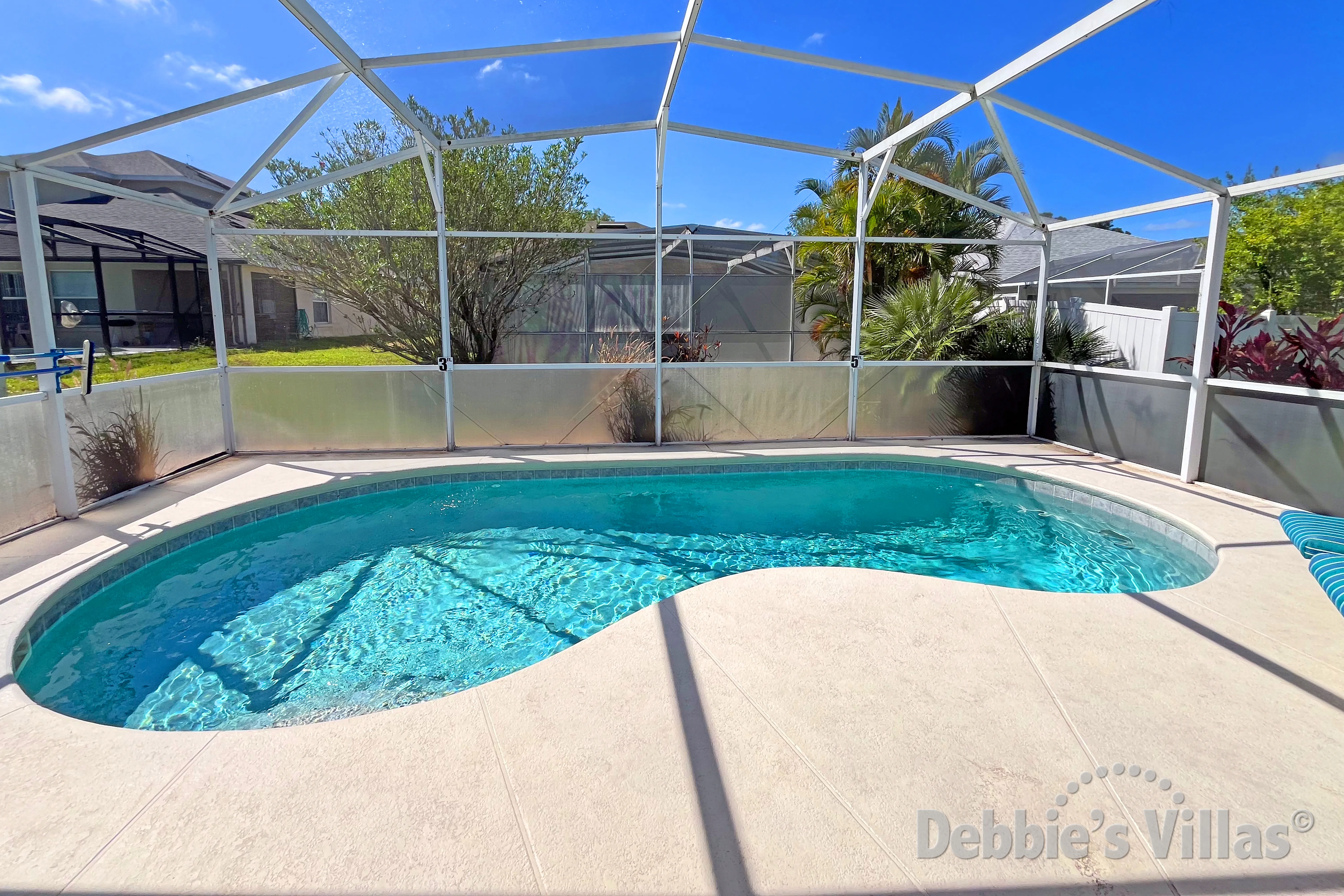 South-facing pool and spa at this vacation villa on Florida Pines in Davenport