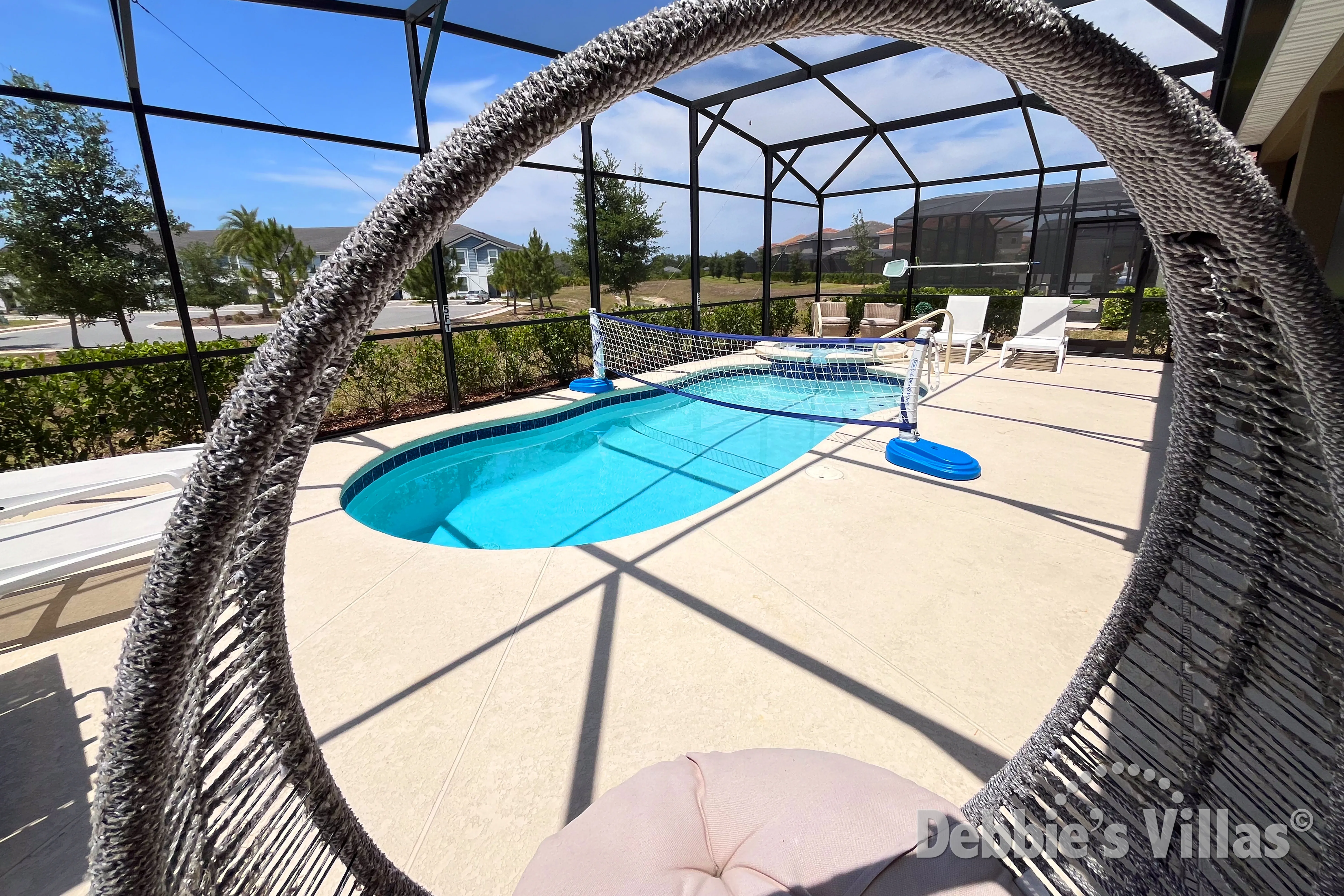 Northwest-facing pool and spa at this vacation villa on Solterra in Davenport 