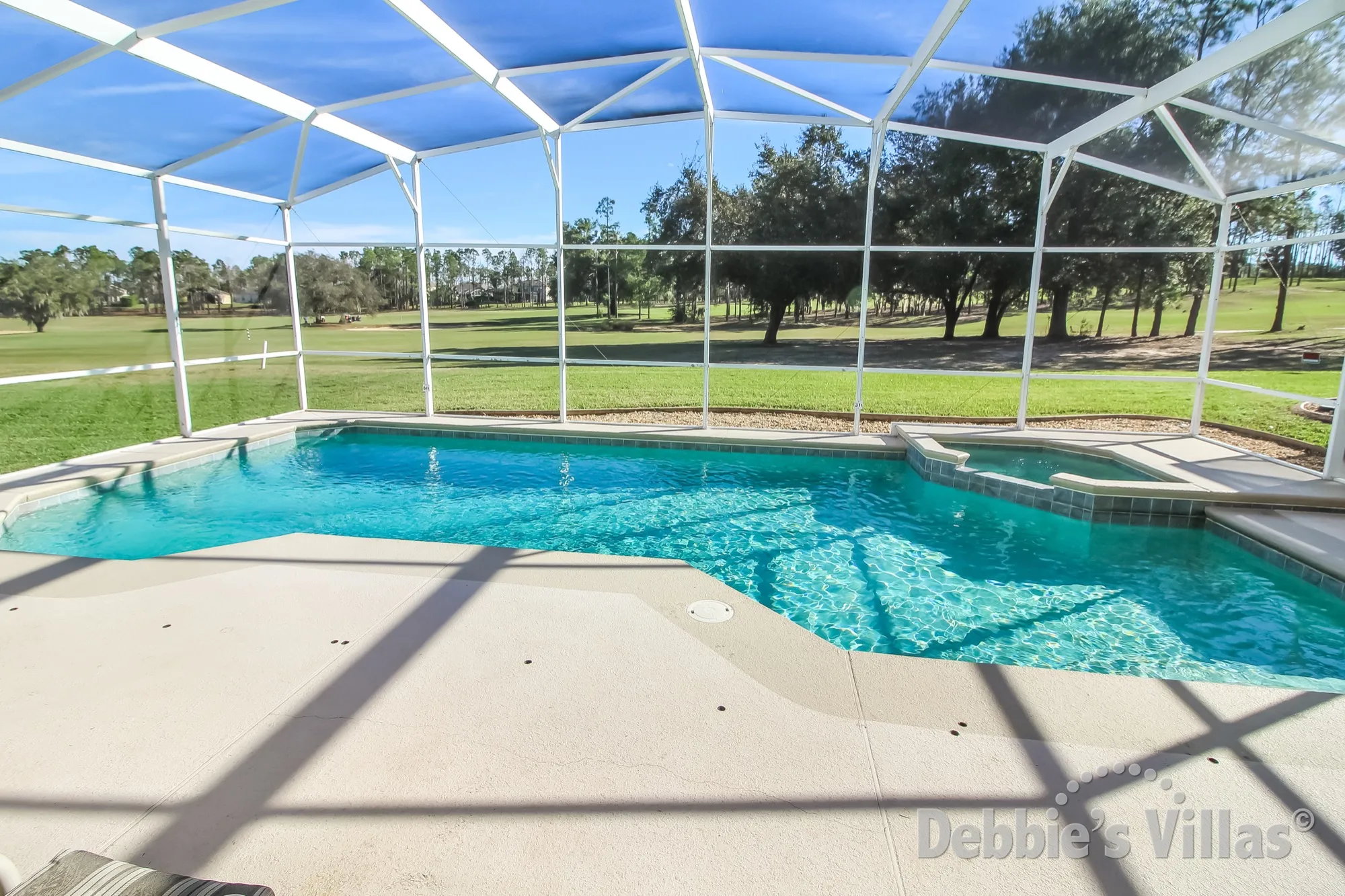 Enjoy a dip in the pool on Highlands Reserve with golf course views
